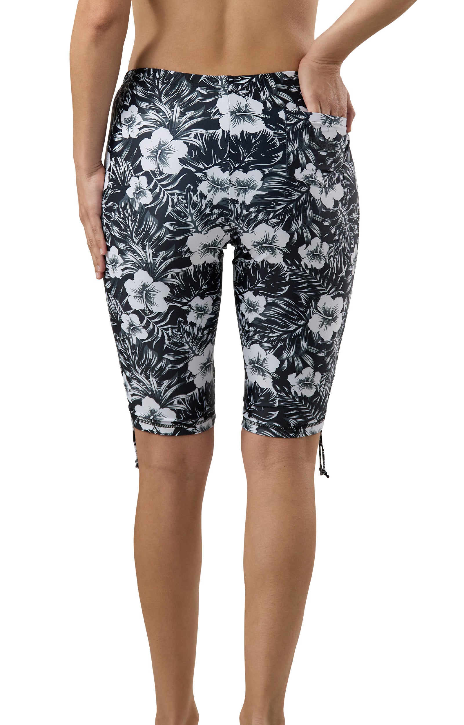 back view of the women's long swim shorts in black paradise|black-paradise