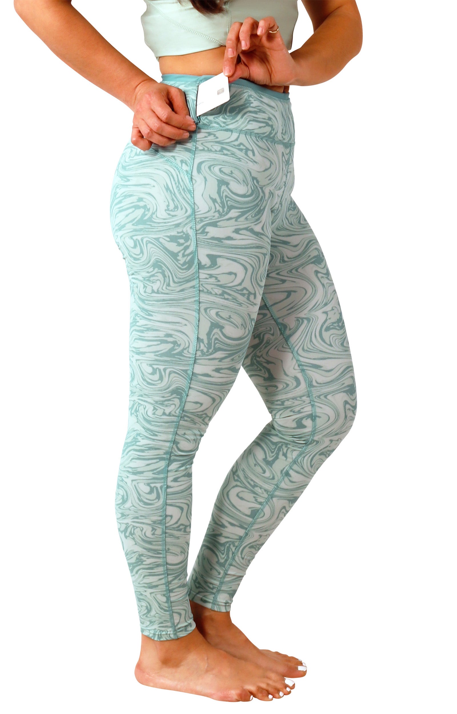 pocket view of women's active sport swim leggingz in river marble|river-marble