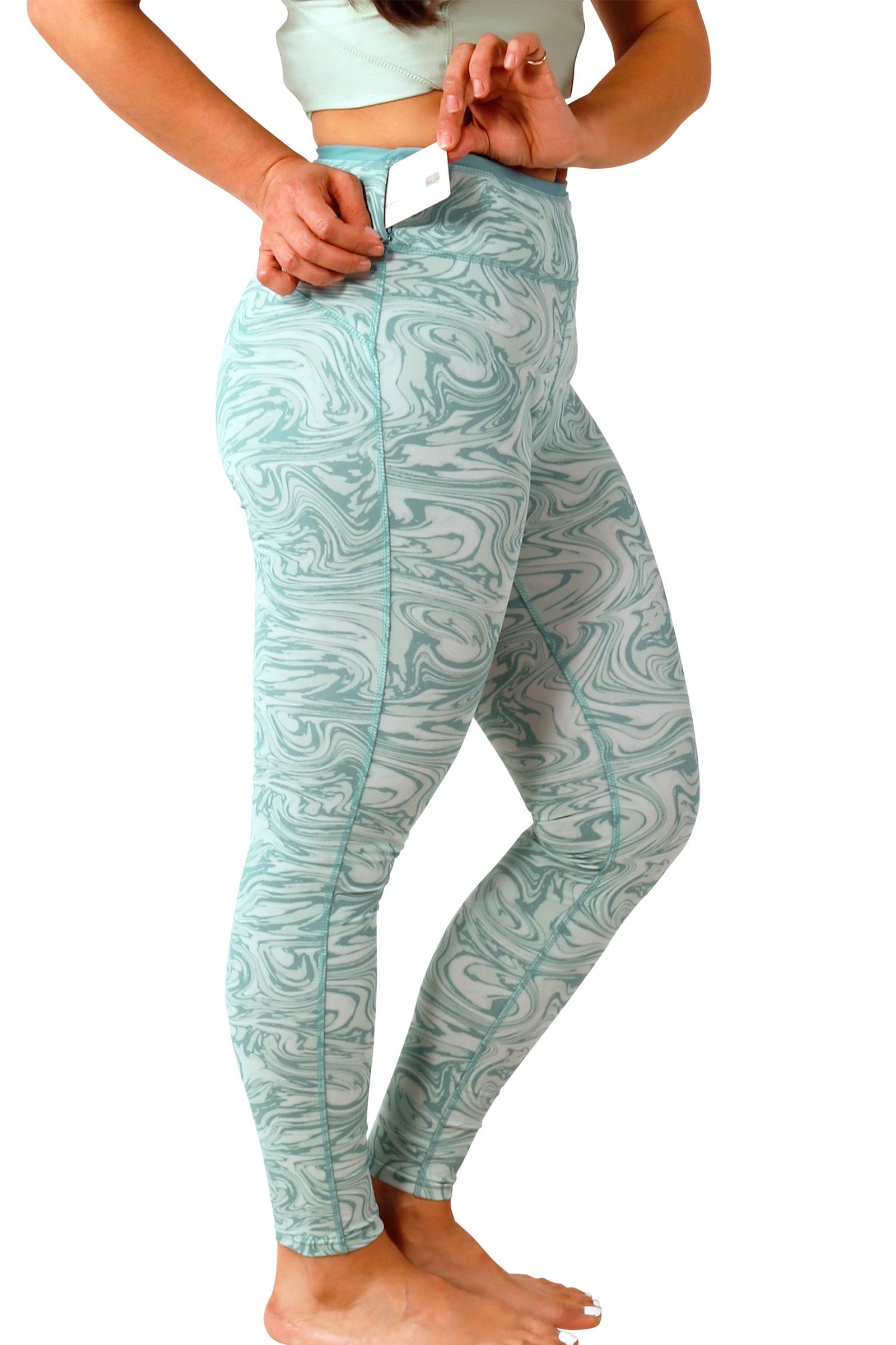 pocket view of women's active sport swim leggingz in river marble|river-marble
