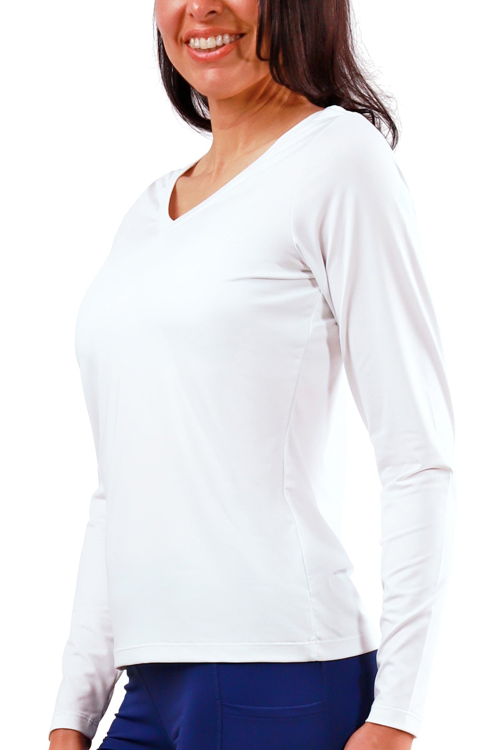 side view of womens long sleeve active reverse neck tee|white