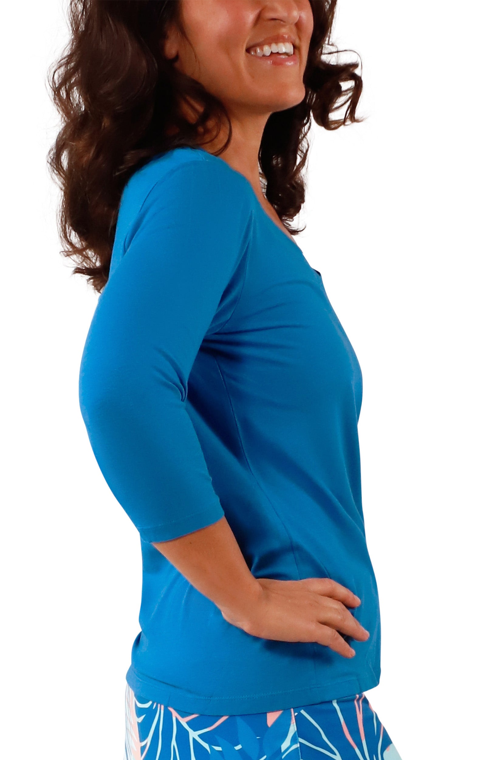 side view of Women's 3/4 Sleeve V-Neck R&R Tee in Mykonos Blue|mykonos-blue