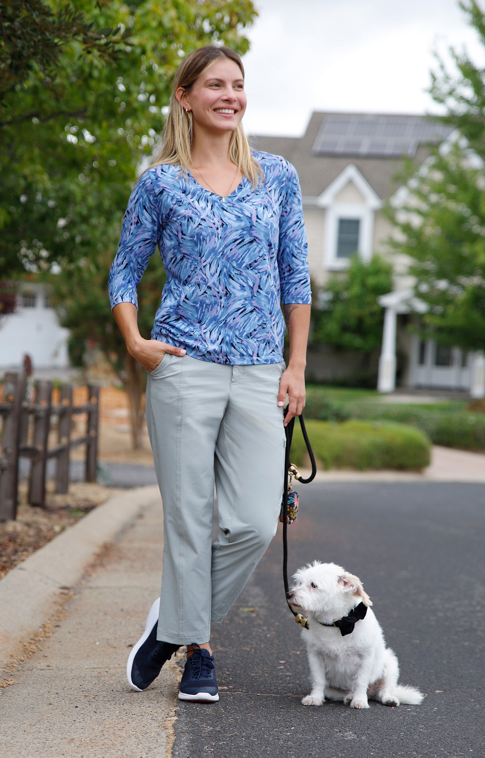 woman walking dog in three quarter sleeve vneck r&r tee in brushstrokes|brushstrokes