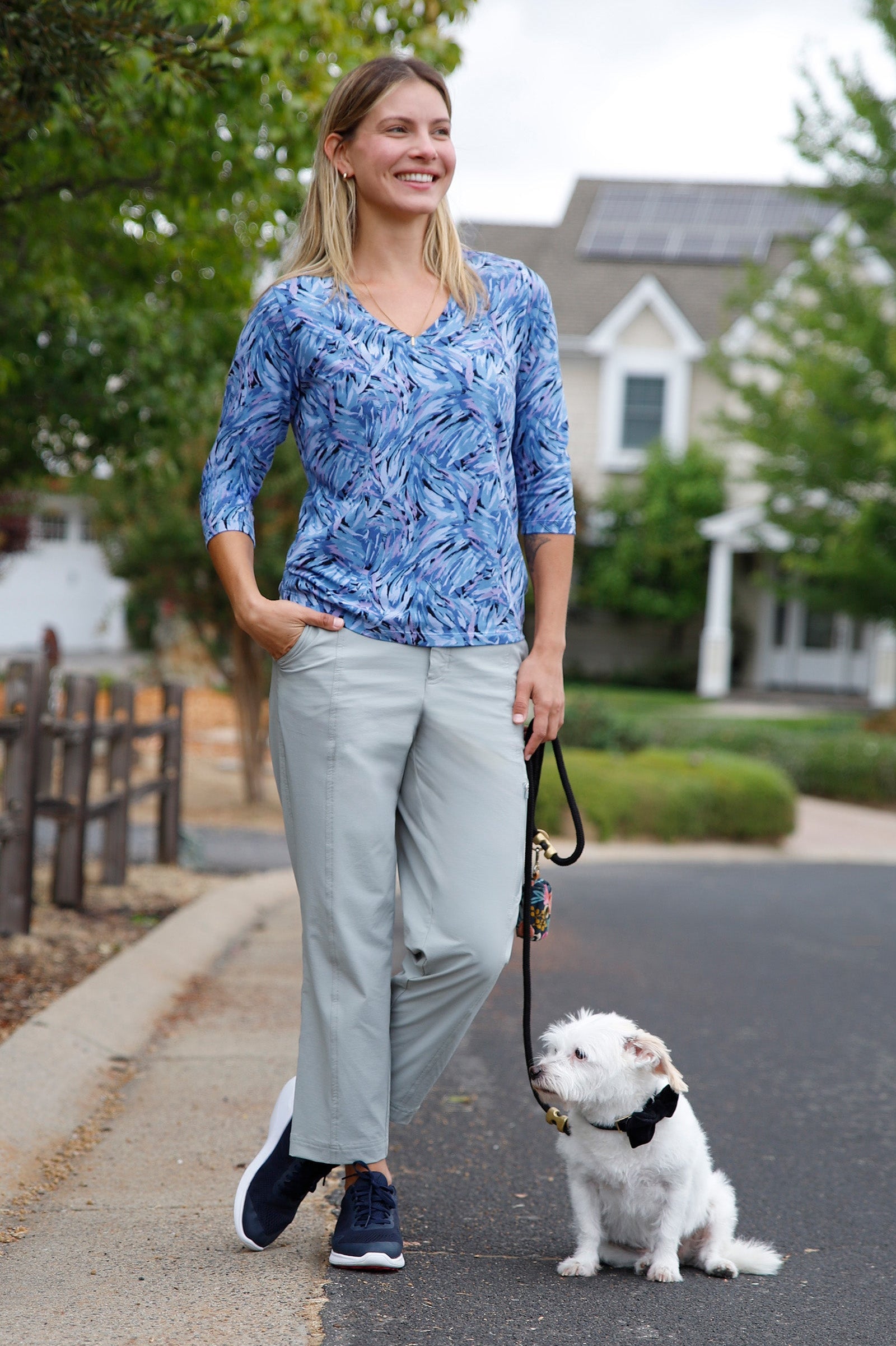 woman walking dog in three quarter sleeve vneck r&r tee in brushstrokes|brushstrokes
