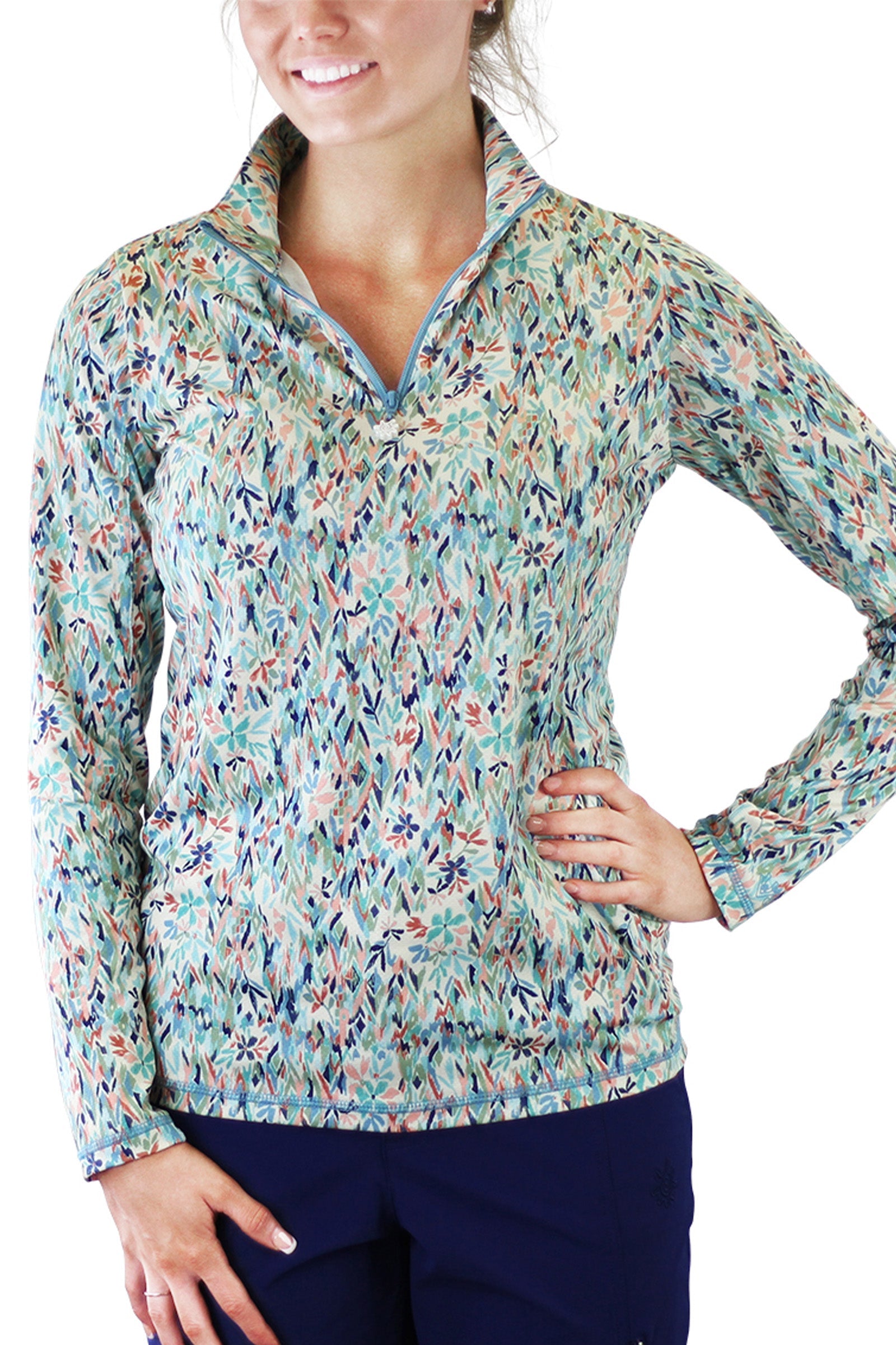 Woman in UV Skinz's Women's Quarter Zip Vented Sun Shirt in Painted Eden|painted-eden
