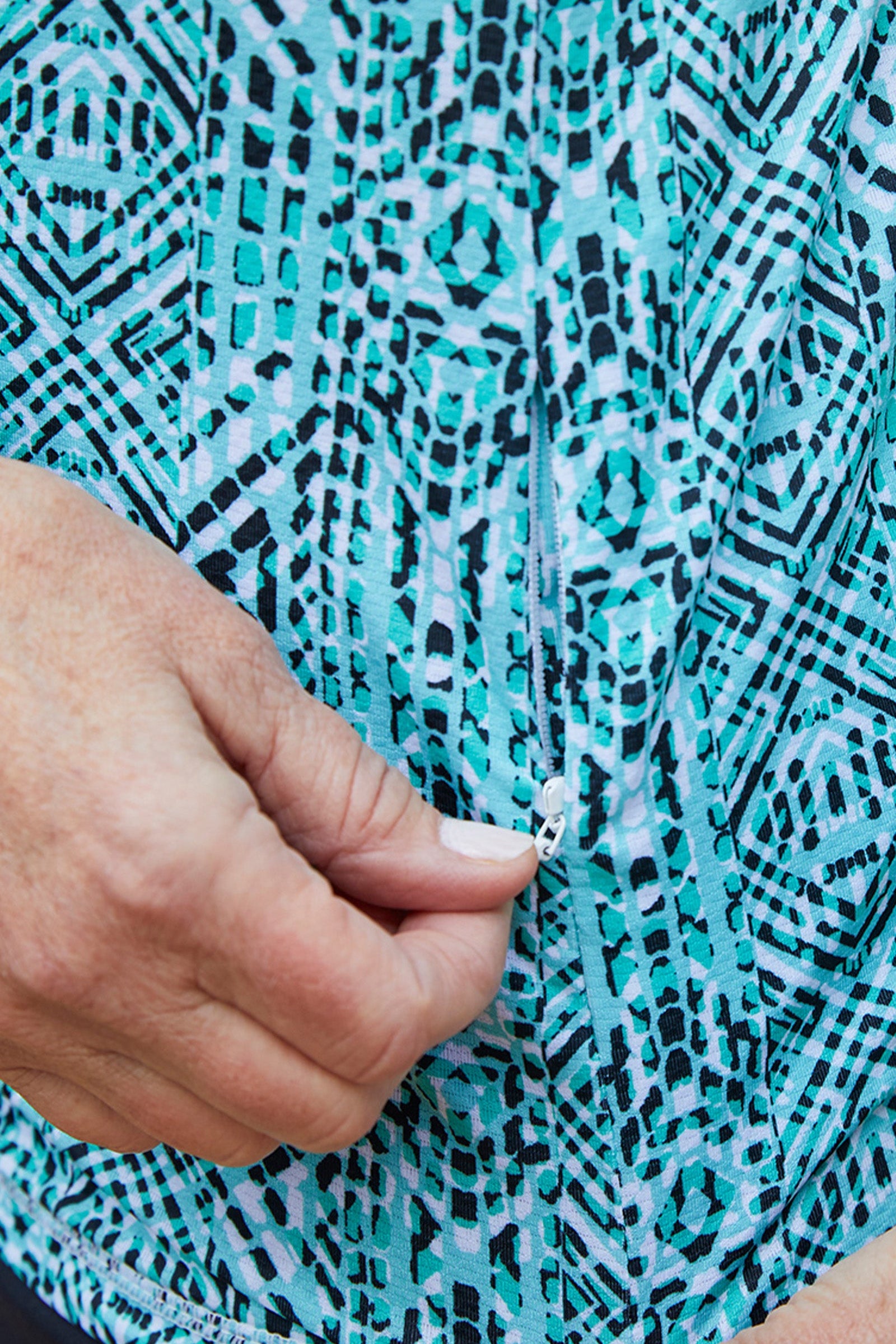 Close Up of the Pocket on the Women's Quarter Zip Vented Sun Shirt in Shasta Mosaic|shasta-mosaic