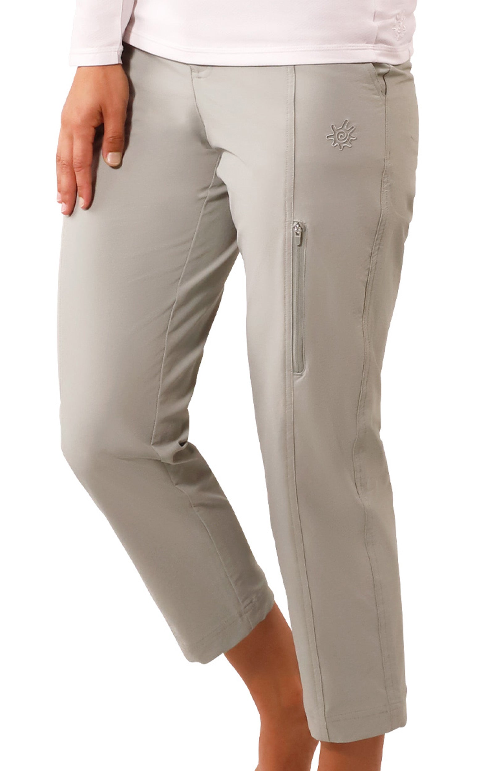 side view of woman in walking capris in agave|agave