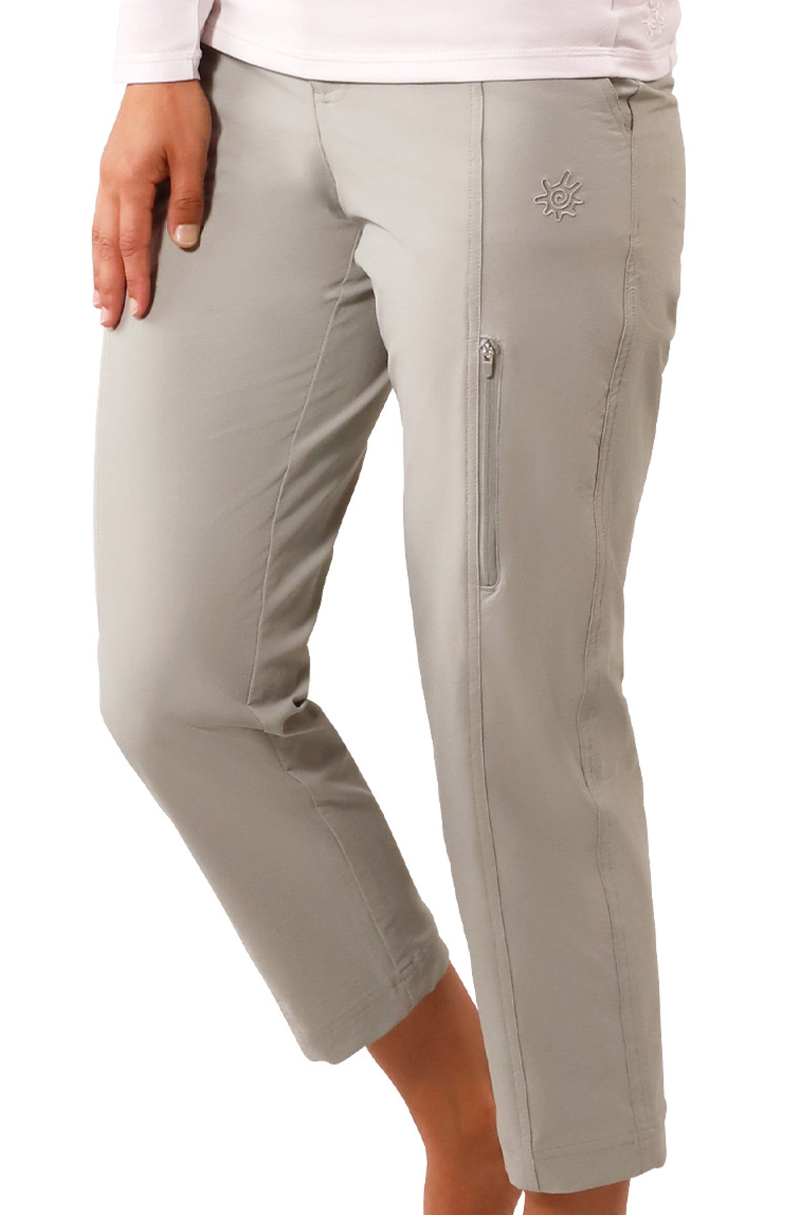 side view of woman in walking capris in agave|agave