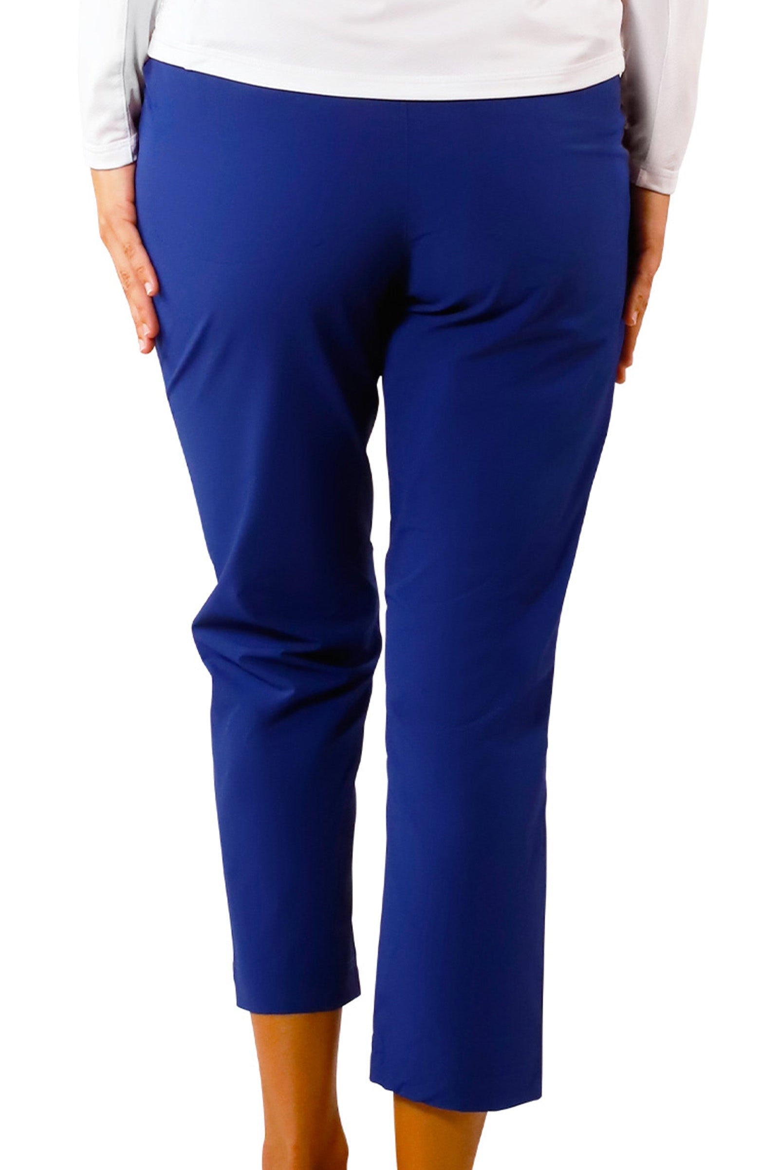 back view of woman in walking capris in dark navy|dark-navy