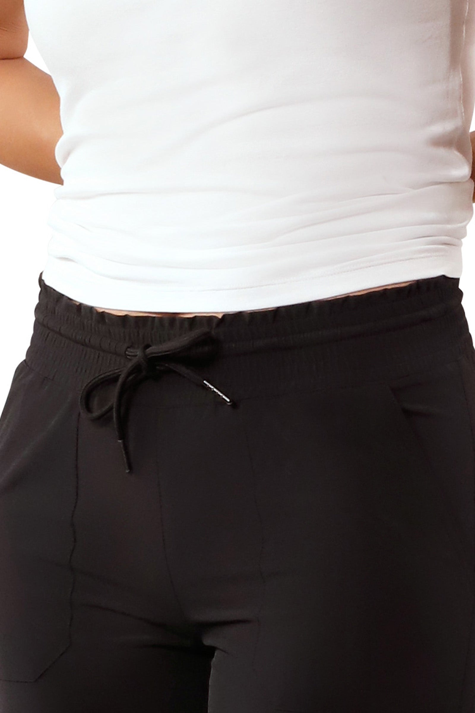 waistband view of womens walking capris in black|black