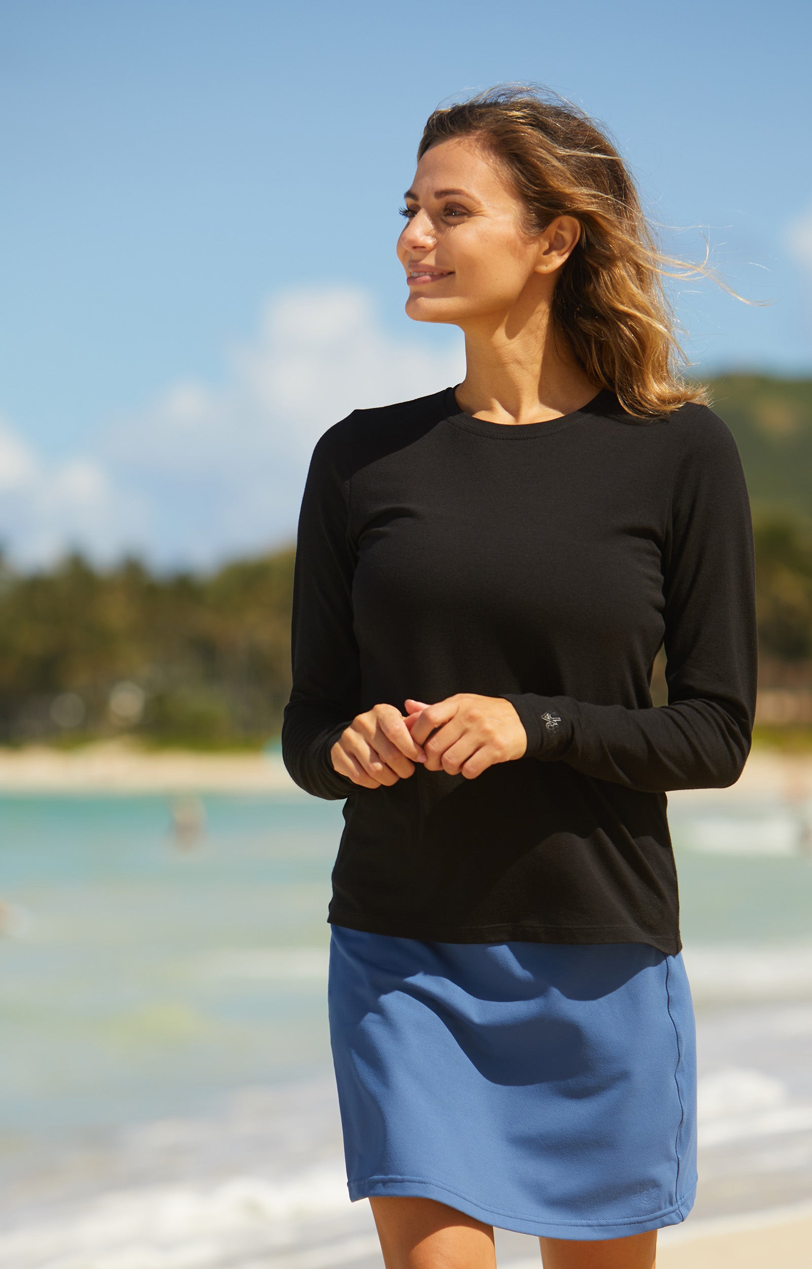 Woman in UV Skinz Women's Long Sleeve Everyday Tee|black