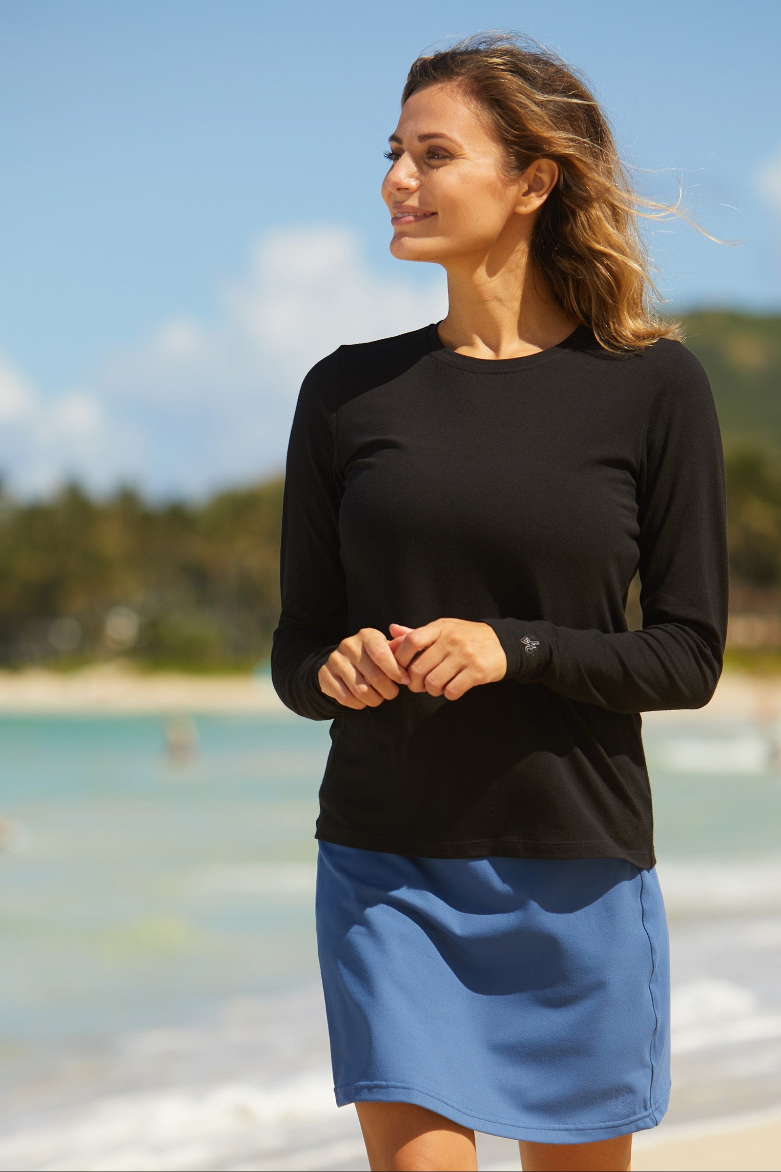 Woman in UV Skinz Women's Long Sleeve Everyday Tee|black