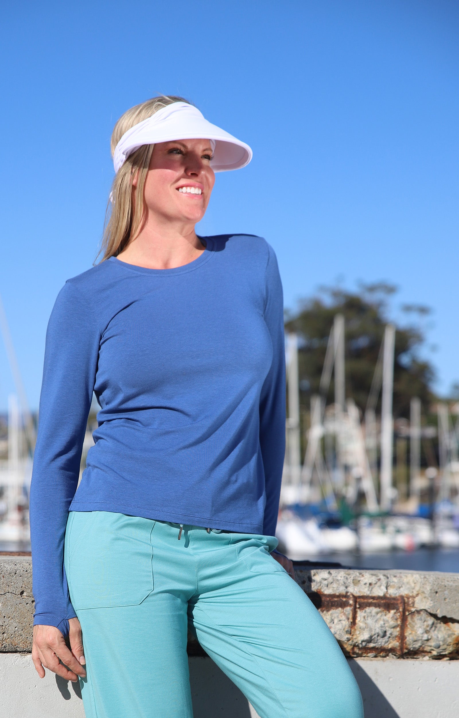 Woman Walking in the Park in UV Skinz's Women's Long Sleeve Everyday Tee|washed-navy