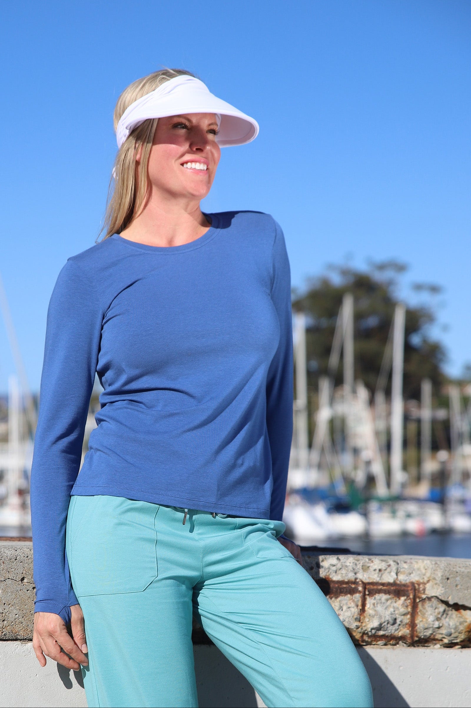 Woman Walking in the Park in UV Skinz's Women's Long Sleeve Everyday Tee|washed-navy