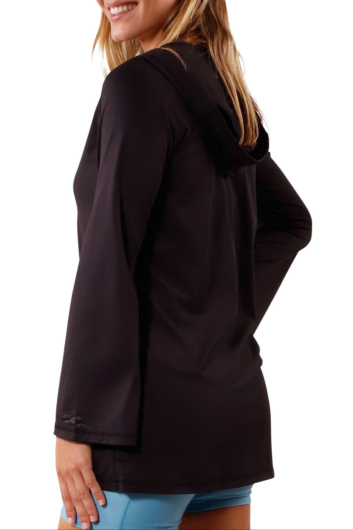 side view of Woman in UV Skinz's Women's Hooded Beach Cover Up|black