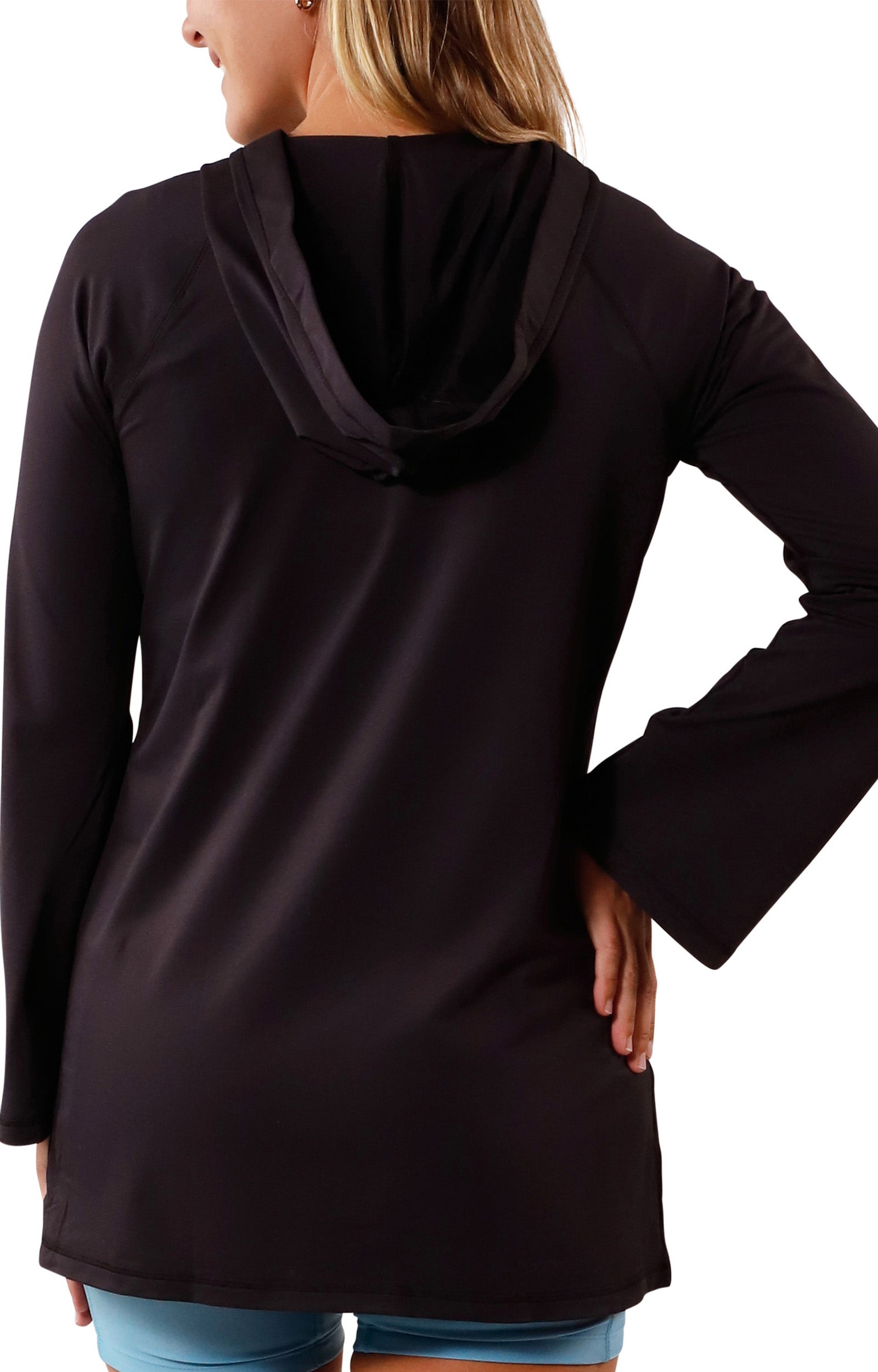 back view of Woman in UV Skinz's Women's Hooded Beach Cover Up|black