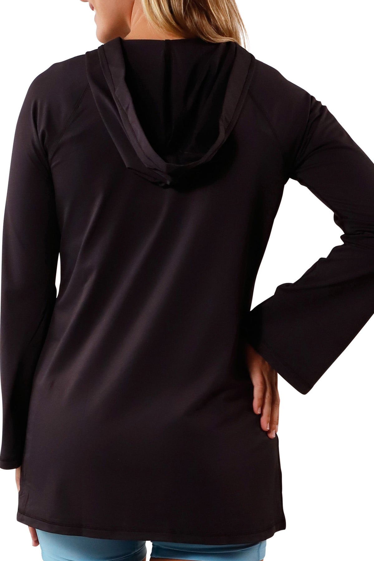 back view of Woman in UV Skinz's Women's Hooded Beach Cover Up|black