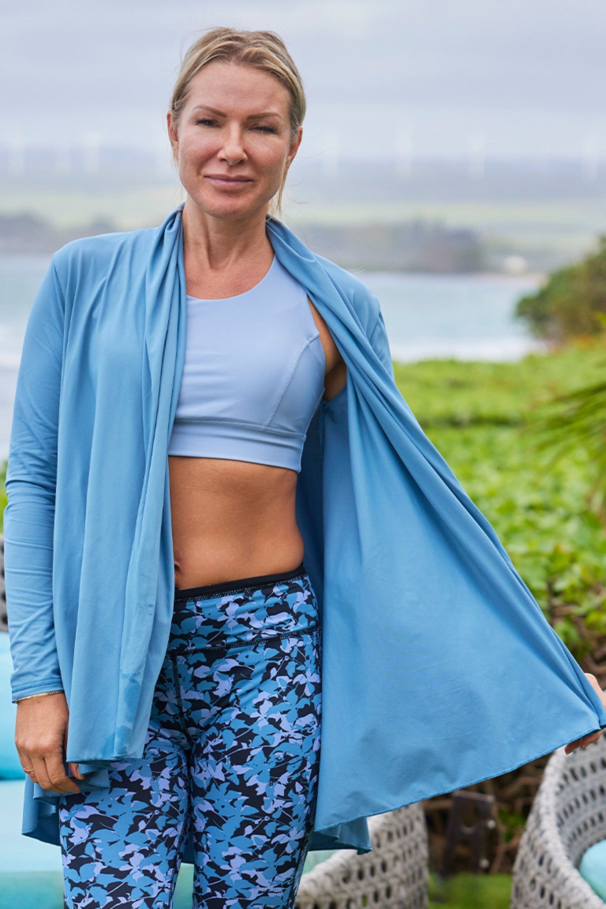 woman in hooded resort wrap in baltic|cool-grey