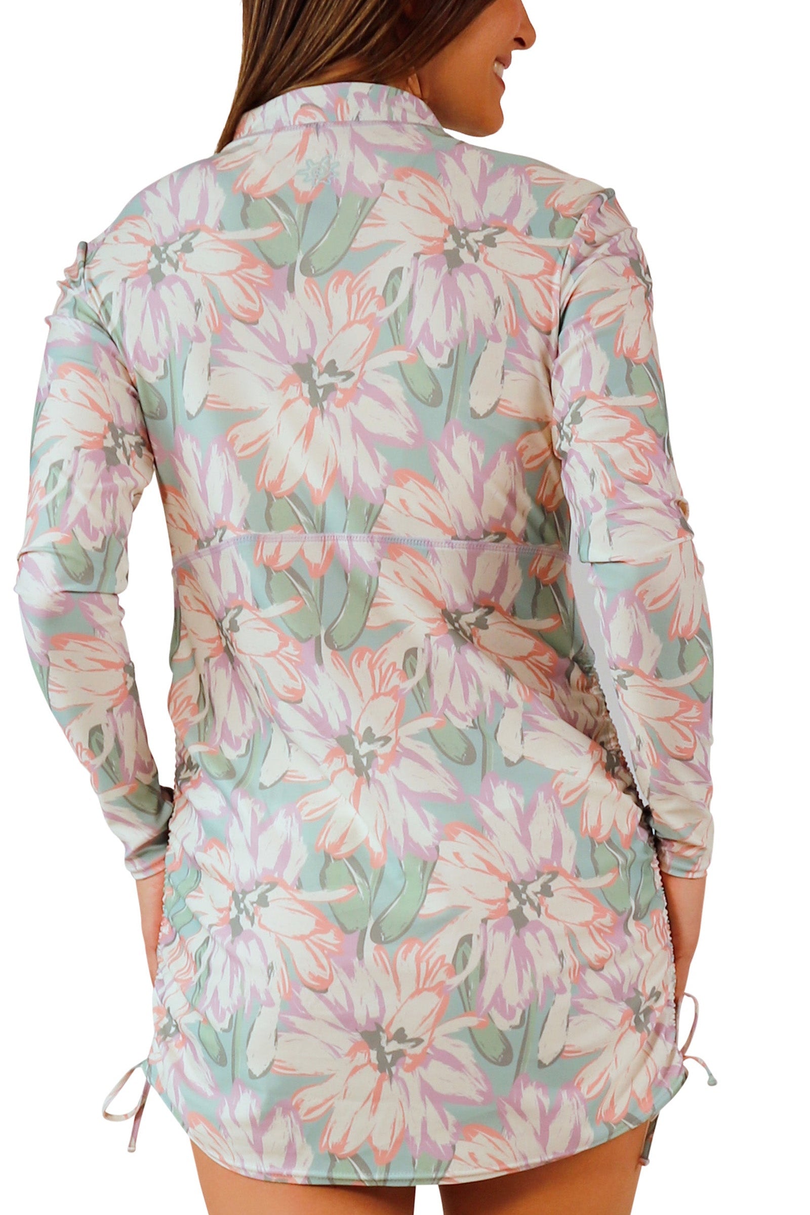 back view of woman in women's convertible swim shirtdress in aurora bloom|aurora-bloom