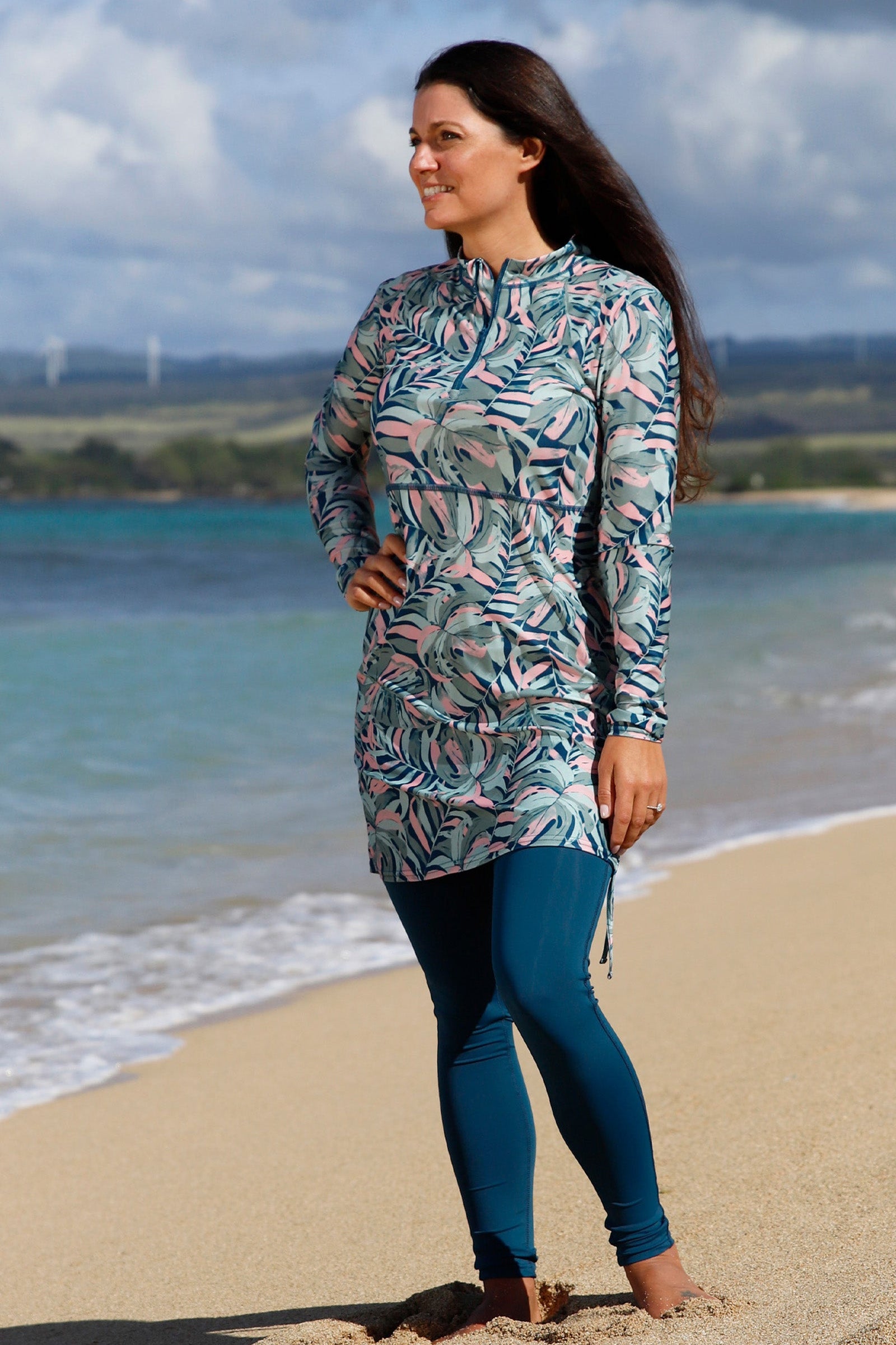 woman posing by the beach in women's convertible swim shirtdress in moonlit canopy|moonlit-canopy