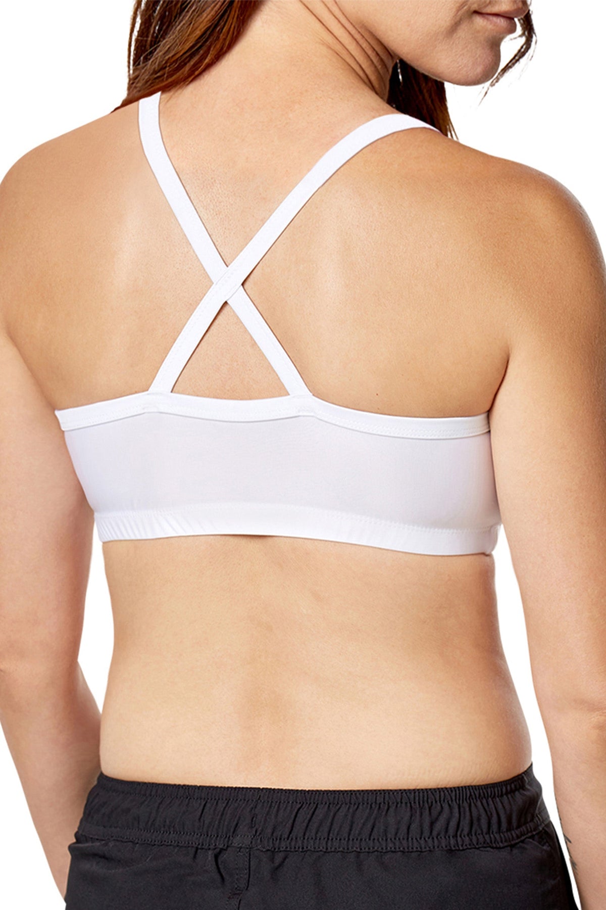 Back view of a woman wearing UV Skinz's swim bra in white|white