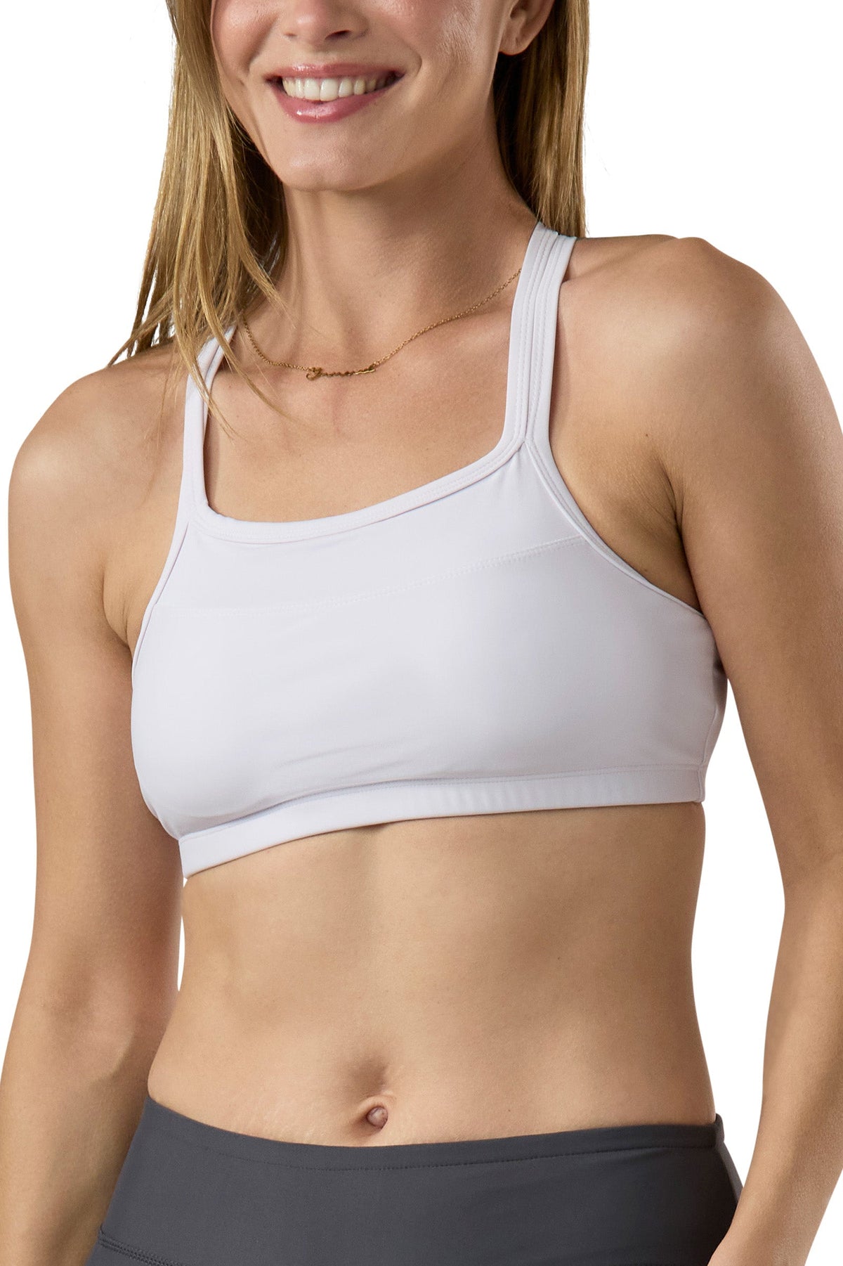 front of the UV Skinz's women's crisscross swim bra in white|white