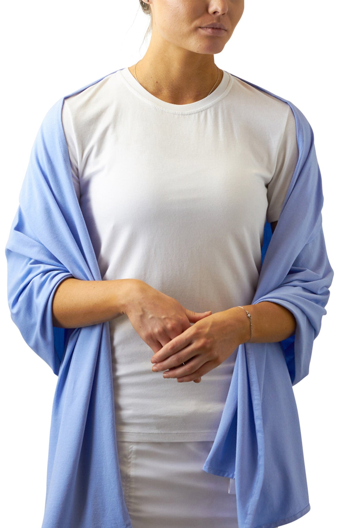 Woman in UV Skinz's women's sun shawl in blue mist