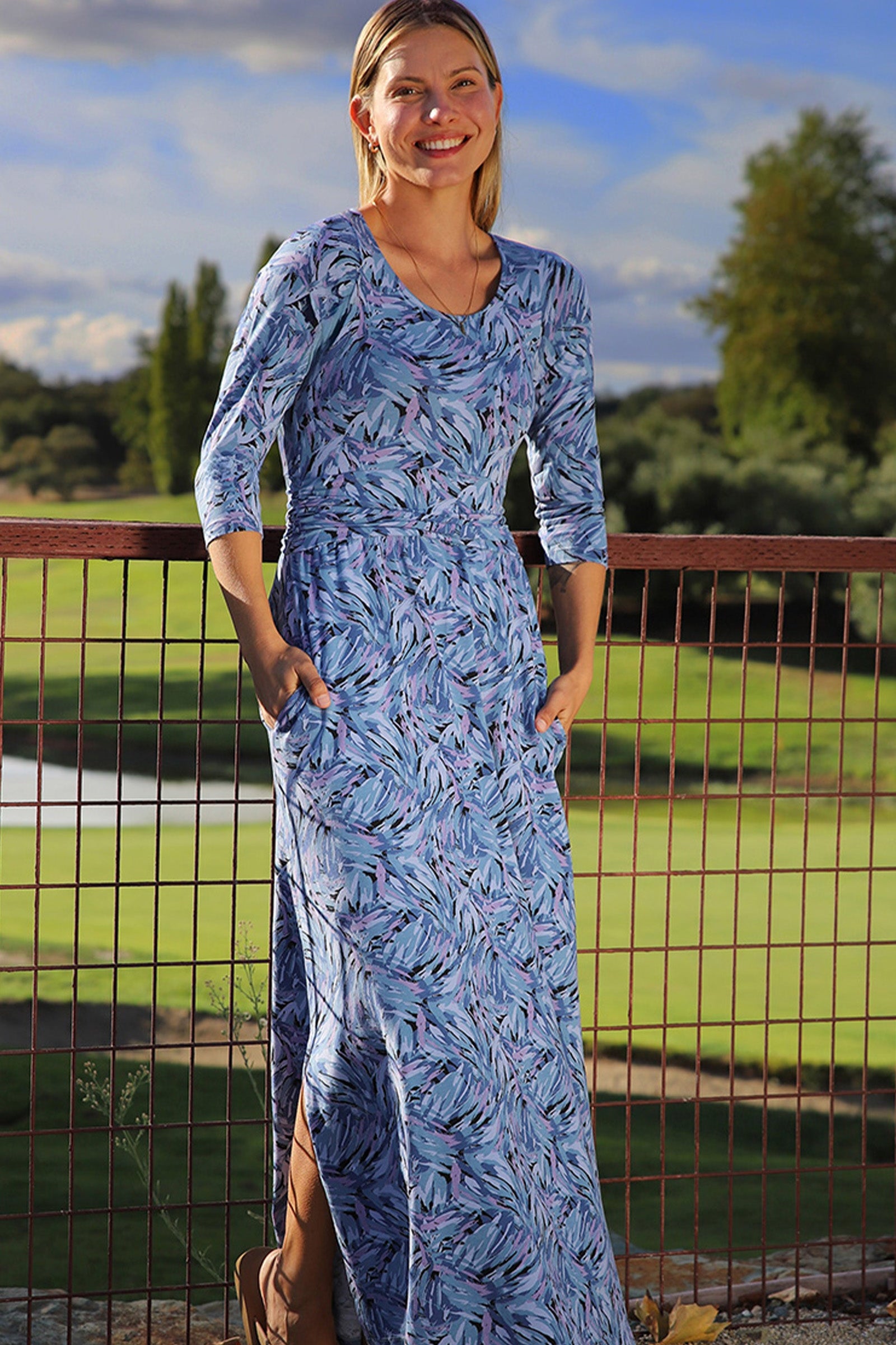 woman in scoop neck maxi dress in brushtrokes|brushstrokes