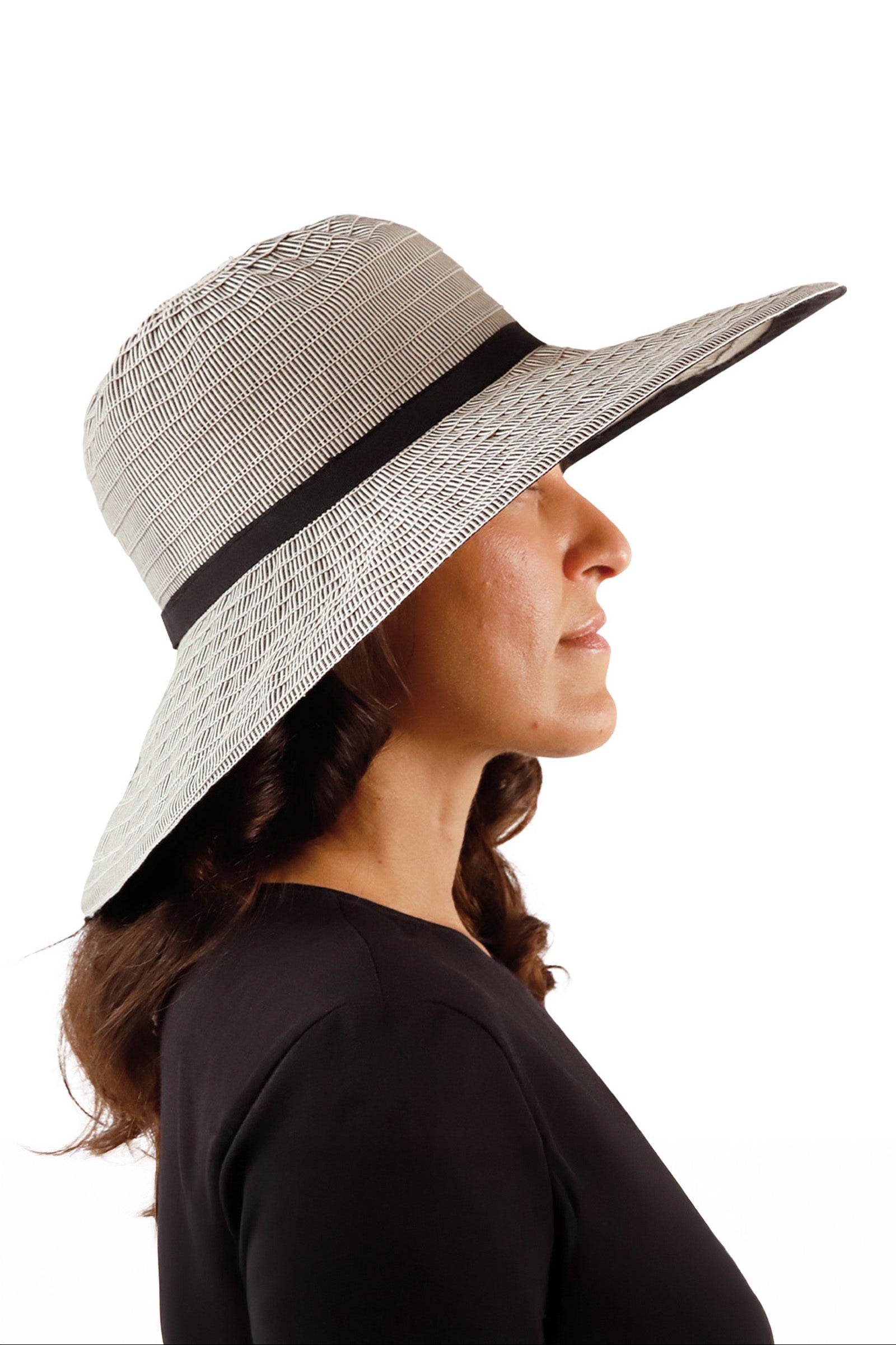 side view of woman in black pacifica hat|black