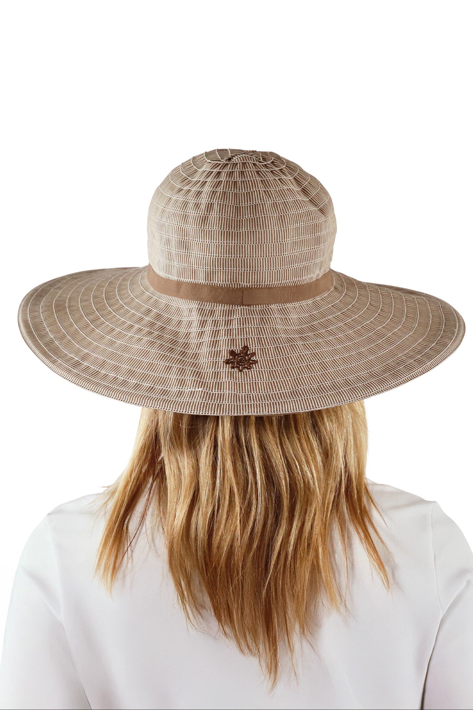 back view of woman in brown pacifica hat|brown