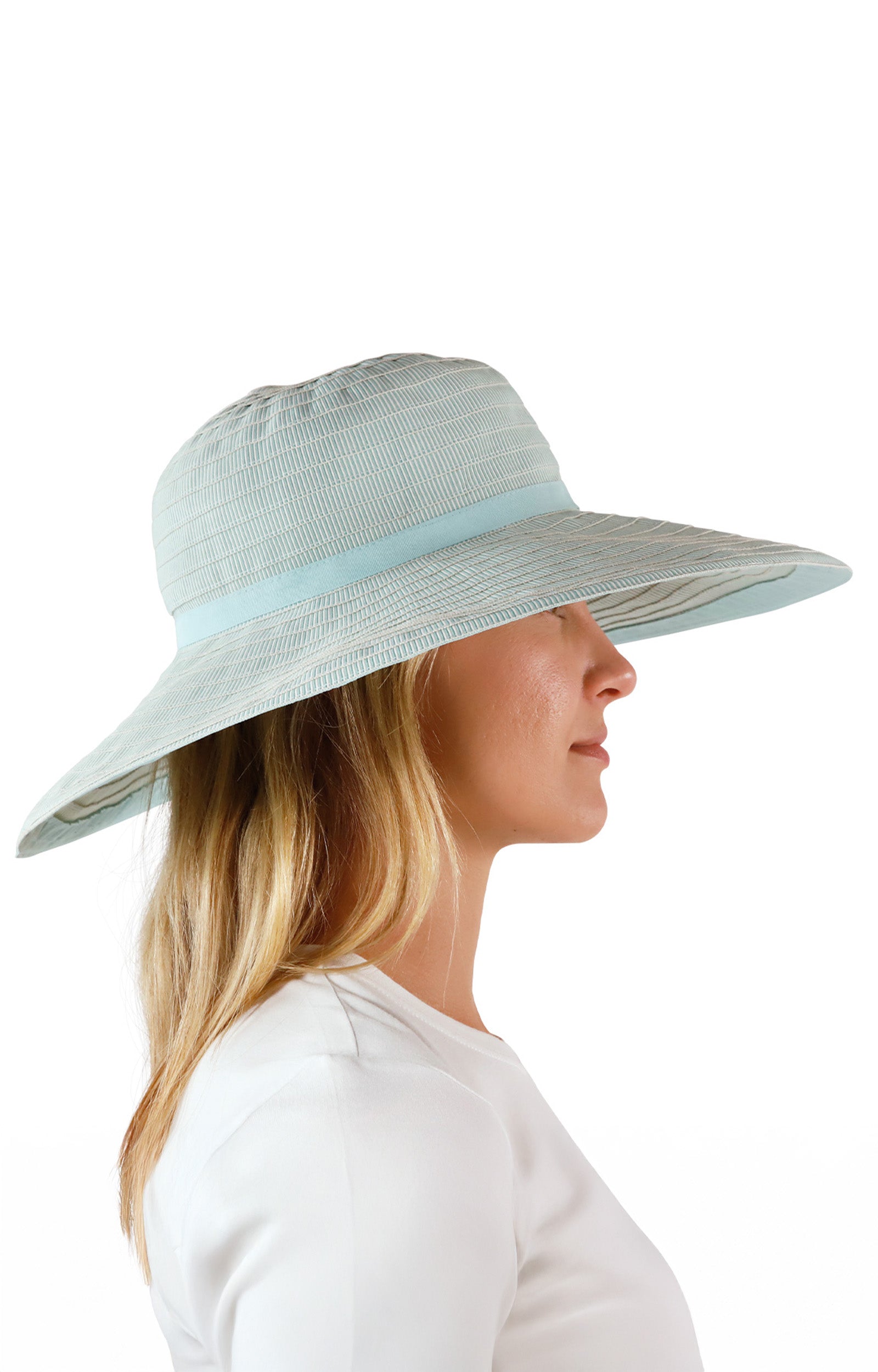 side view of woman in river pacifica hat|river