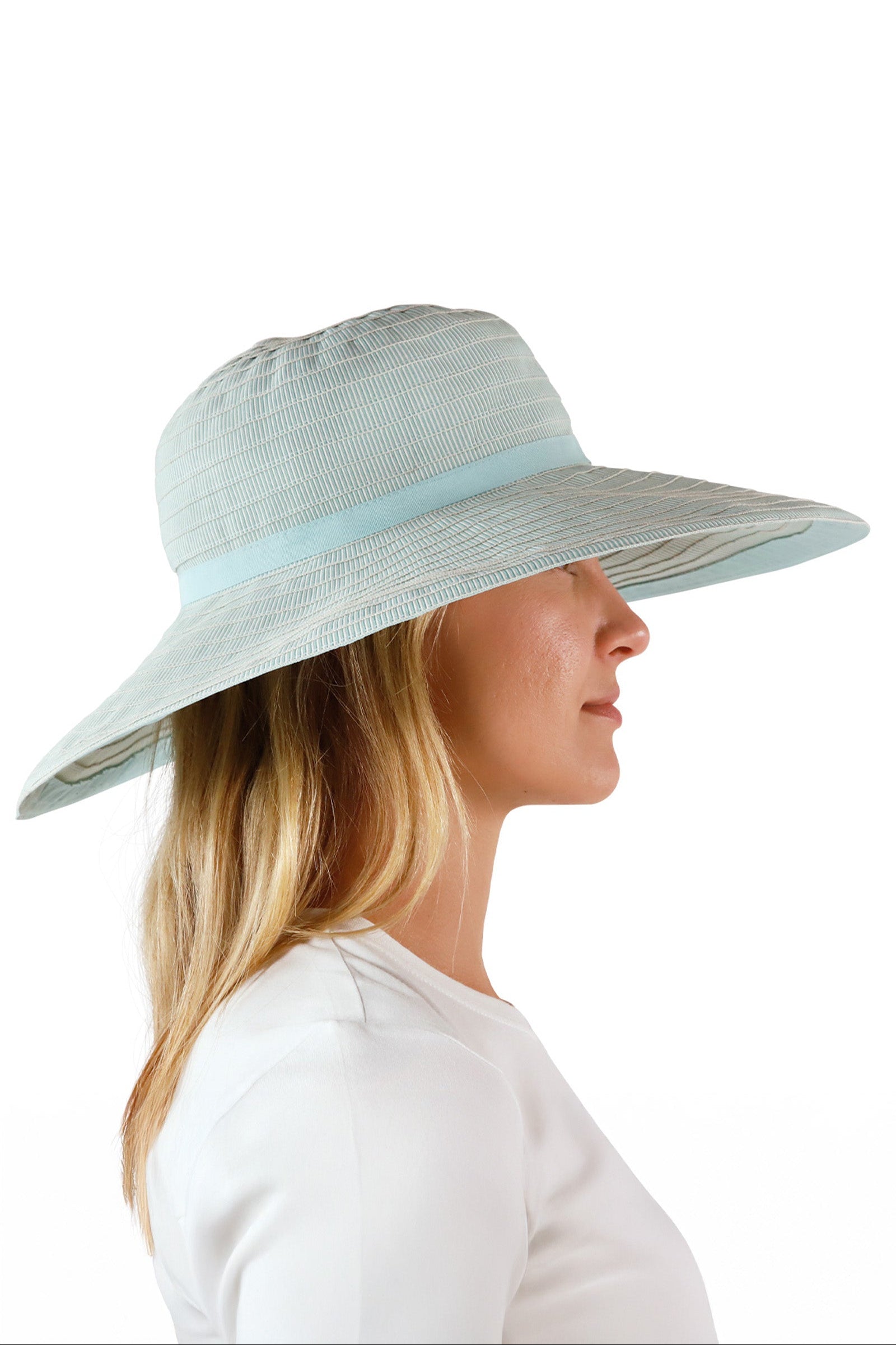 side view of woman in river pacifica hat|river