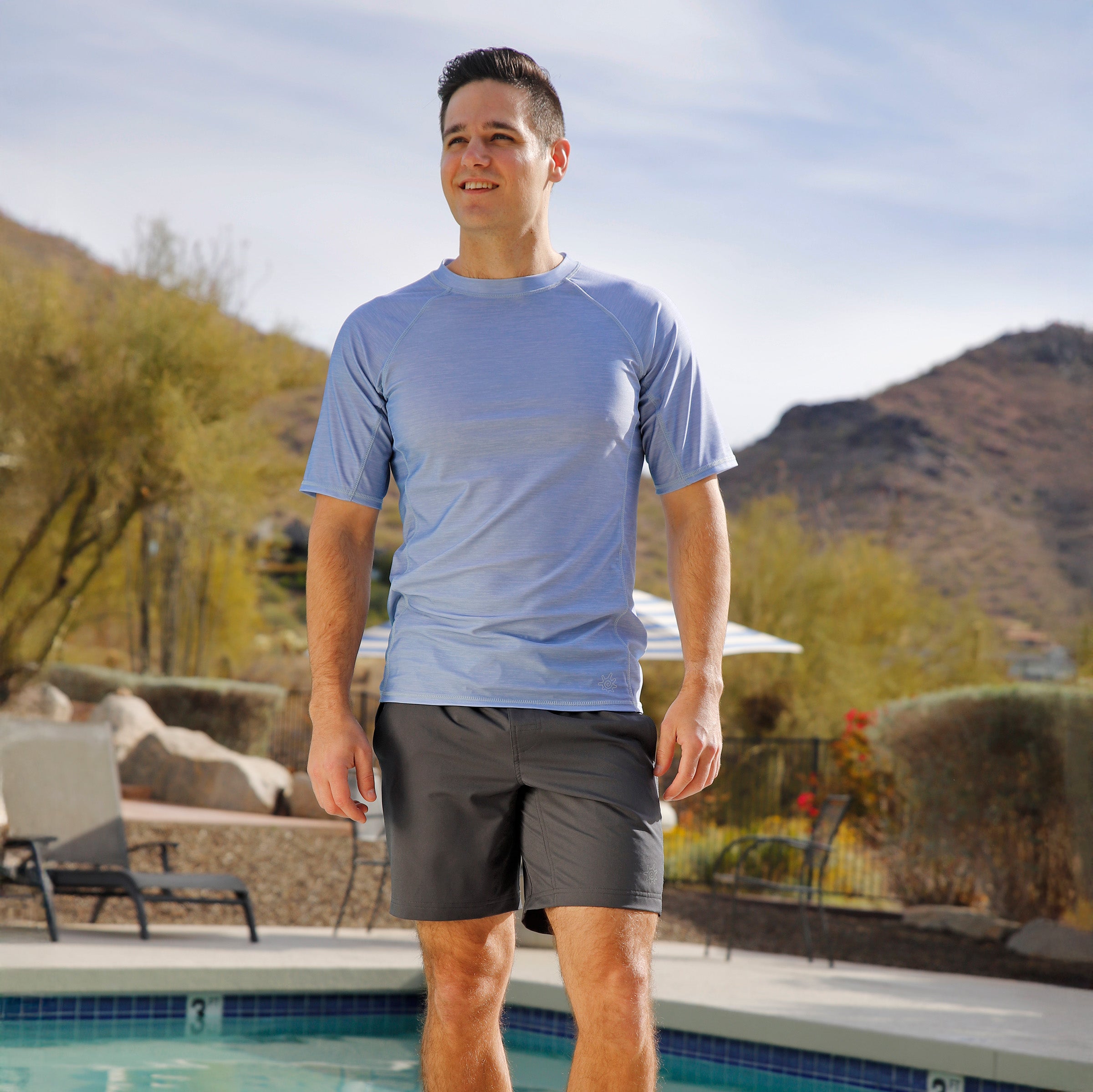 man by the pool wearing mens short sleeve crew sun & swim shirt|coastal-jaspe