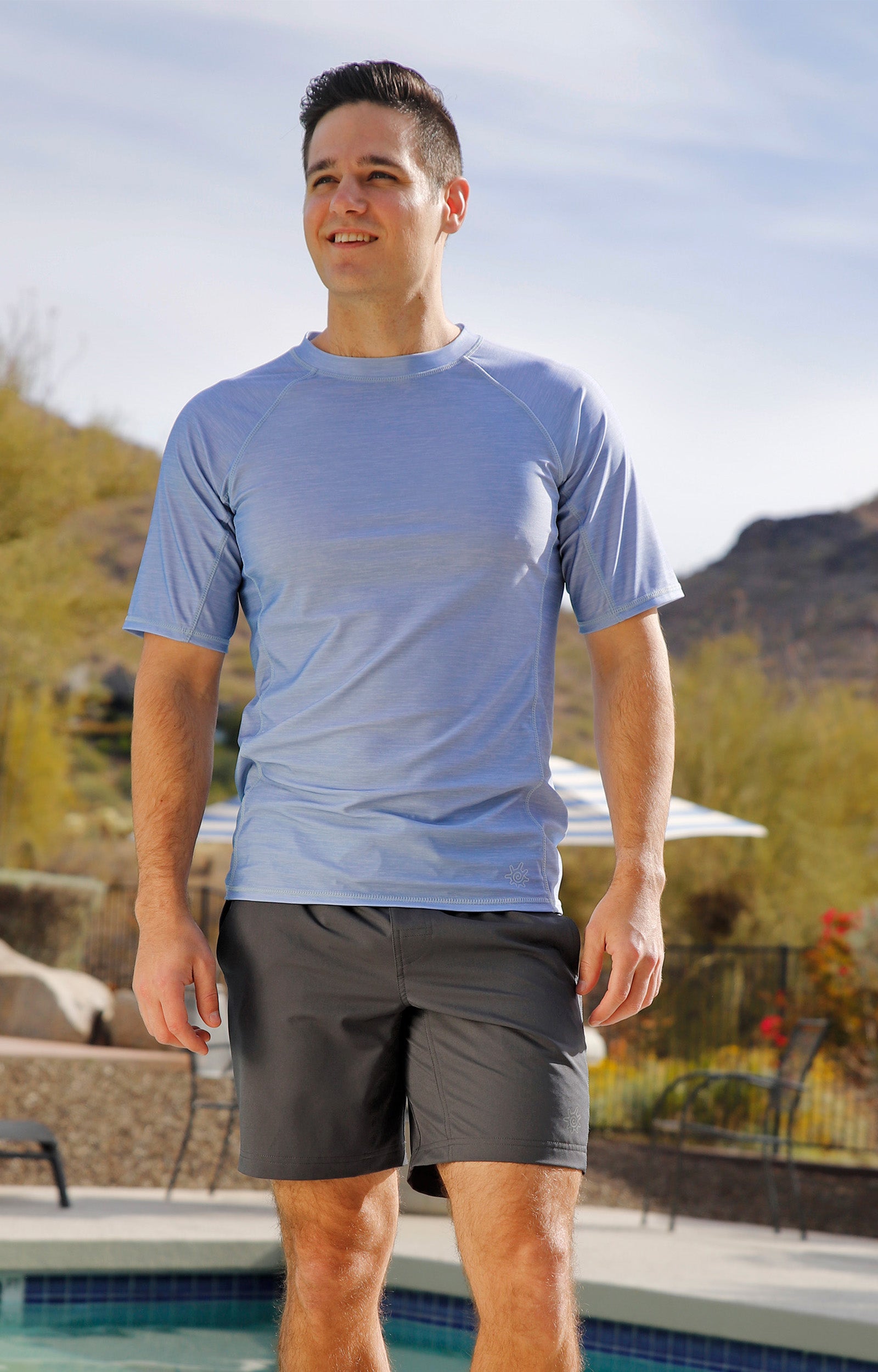 man by the pool wearing mens short sleeve crew sun & swim shirt|coastal-jaspe