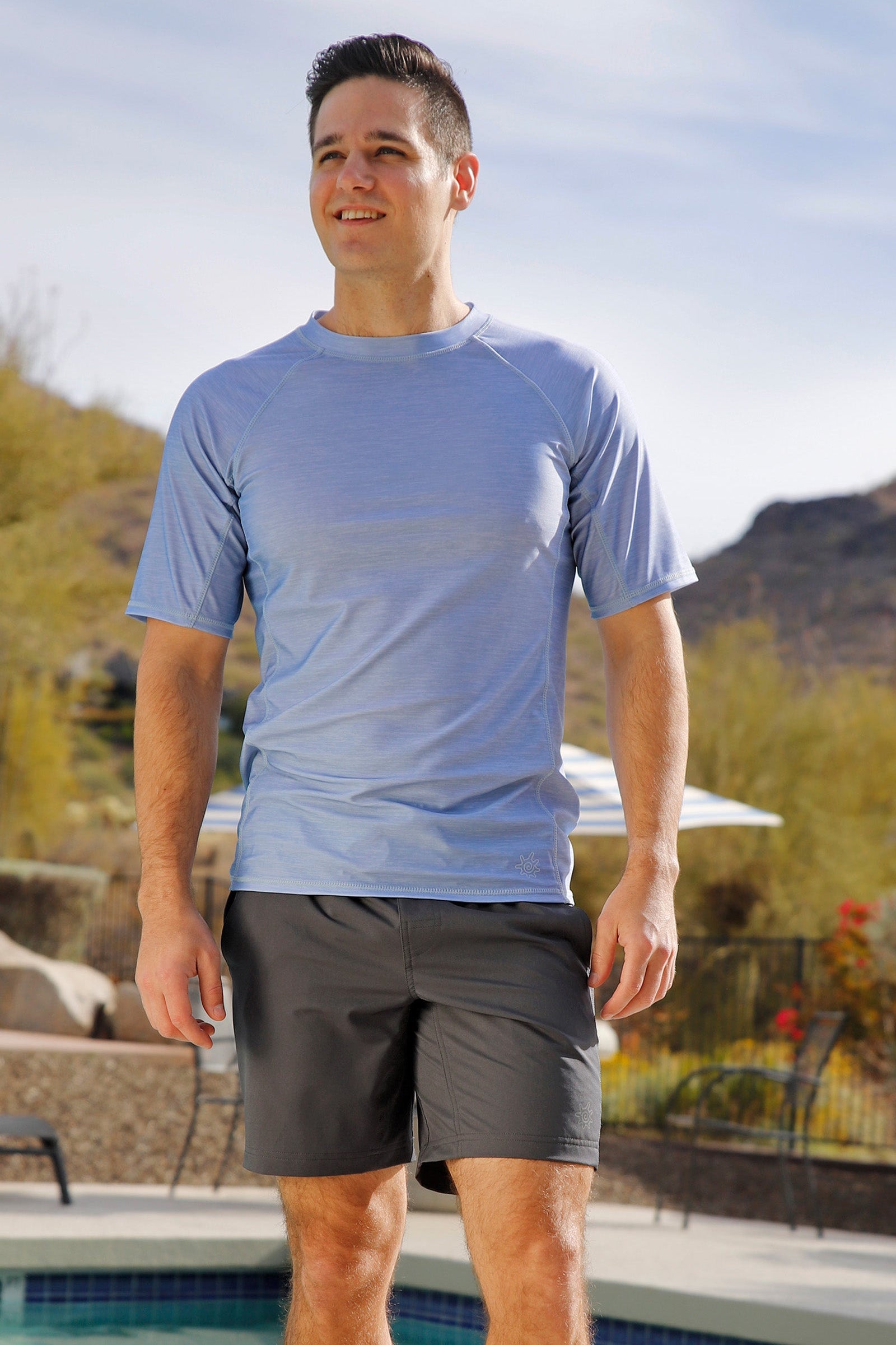 man by the pool wearing mens short sleeve crew sun & swim shirt|coastal-jaspe