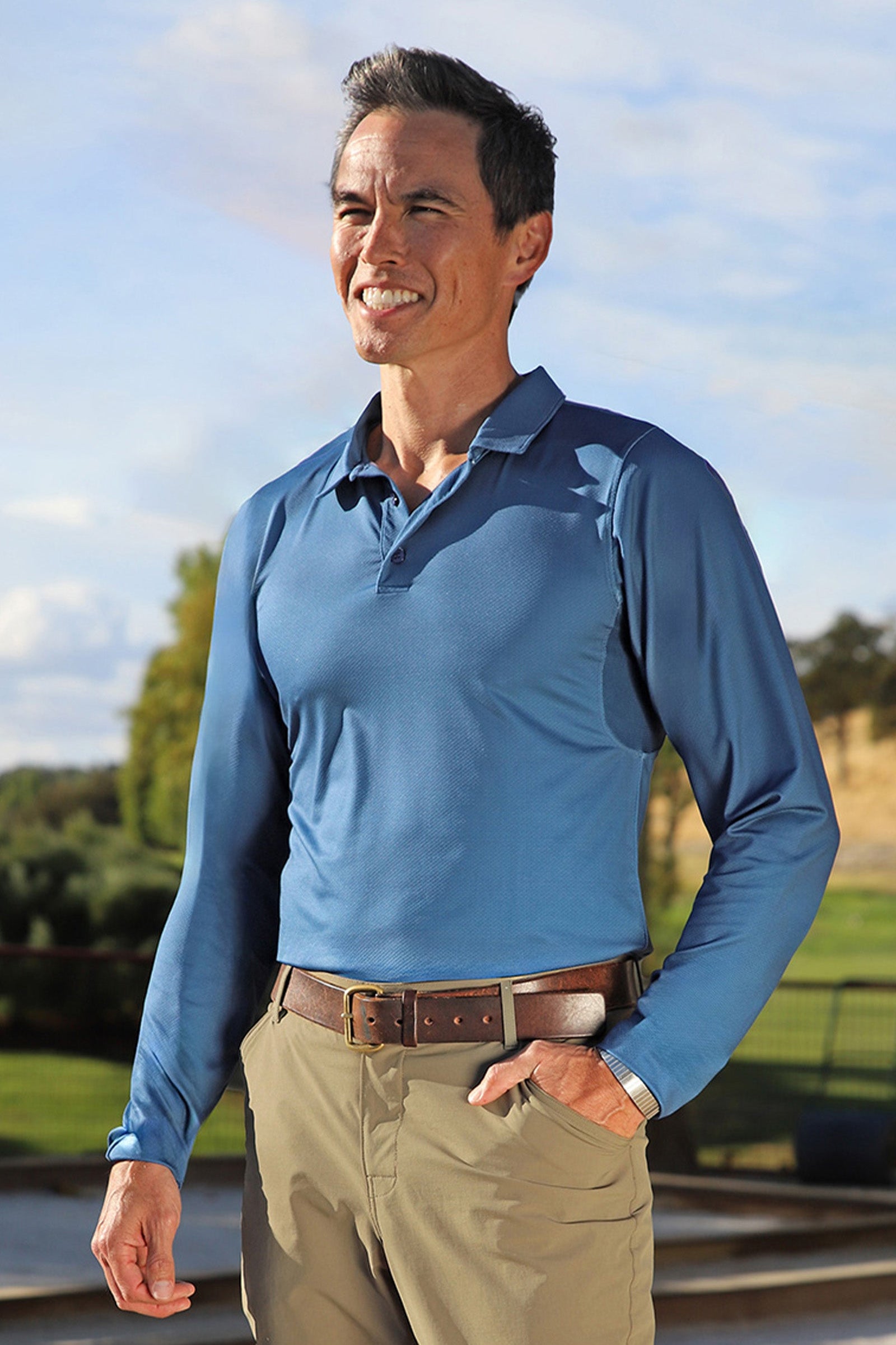 man in long sleeve performance polo in blue links|blue-links
