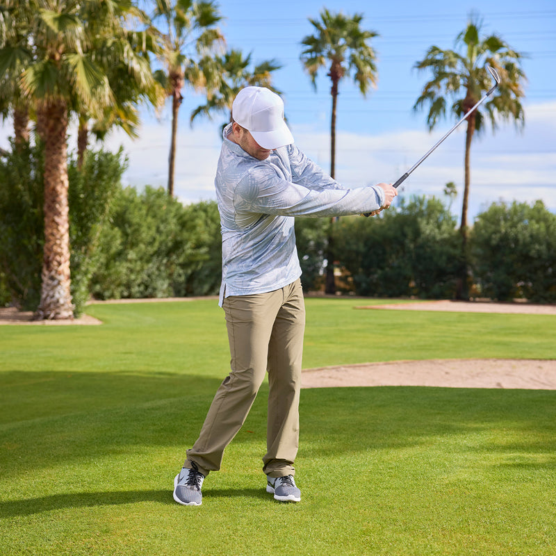 man golfing in long sleeve performance polo|tropical-links