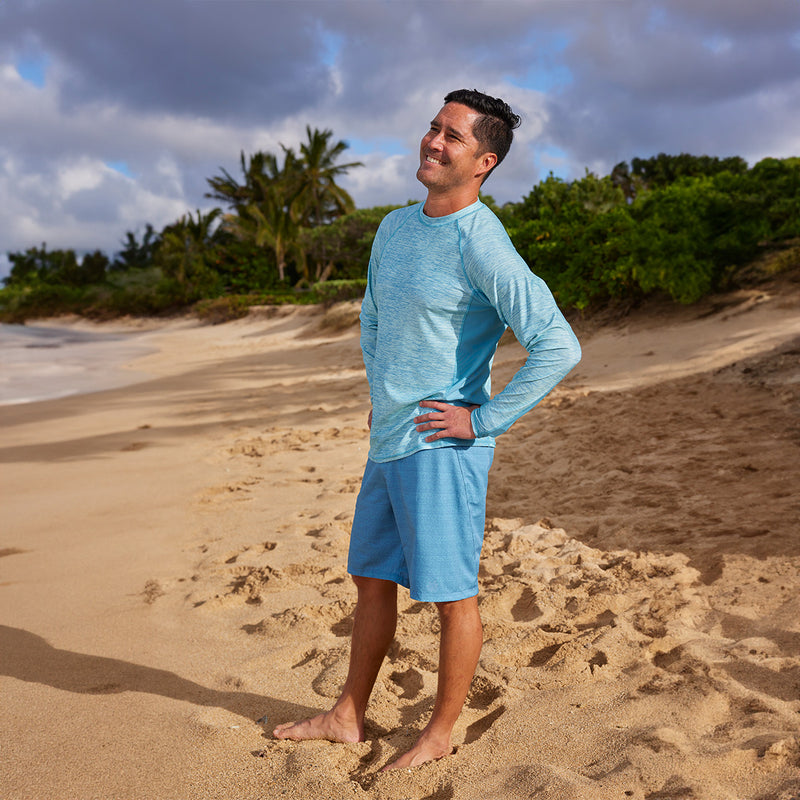 man on a beach in coastal board shorts|baltic-aztec-stripe