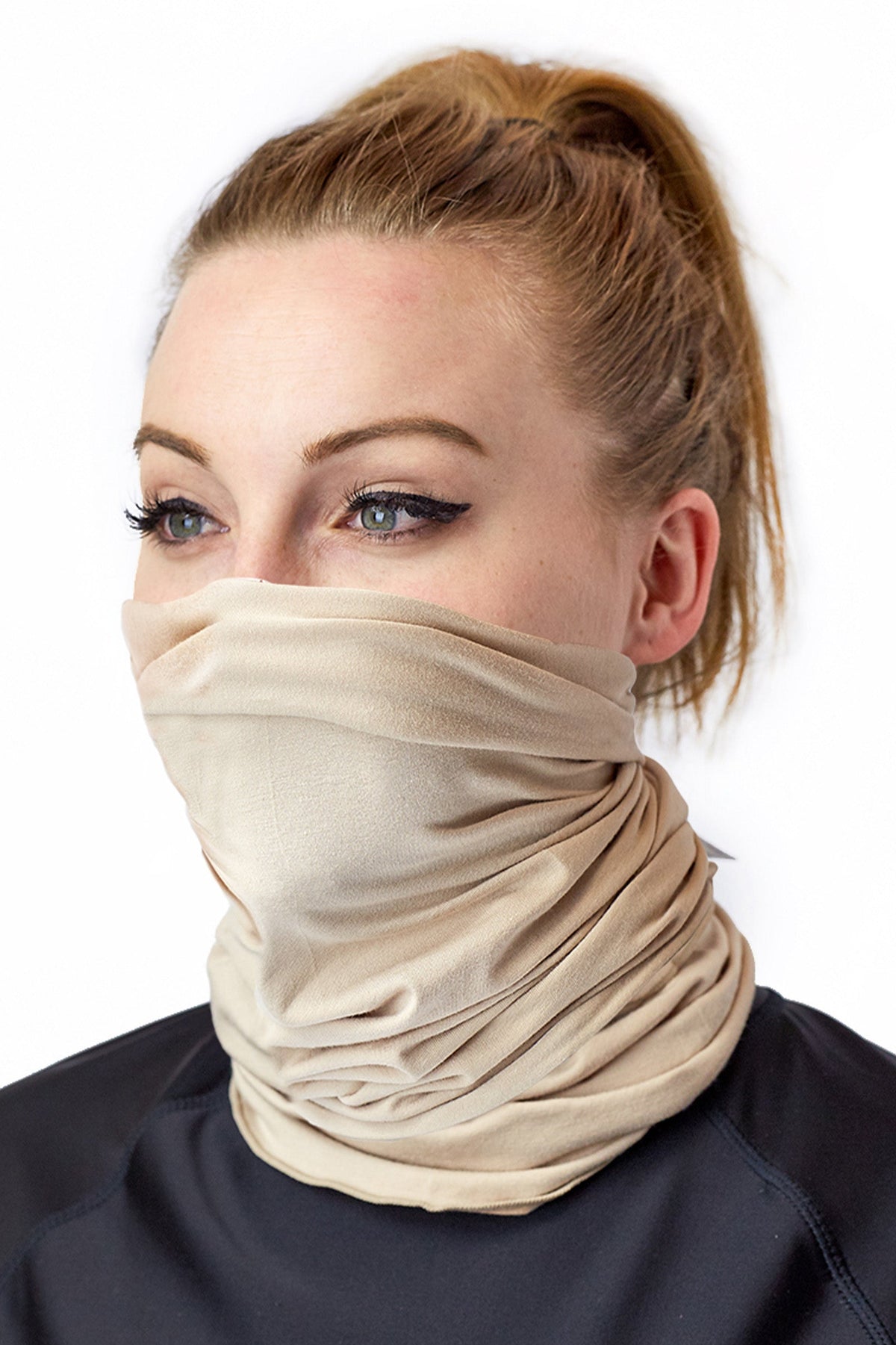 Woman Wearing the Bamboo UV Neck and Face Covering in Sand|sand