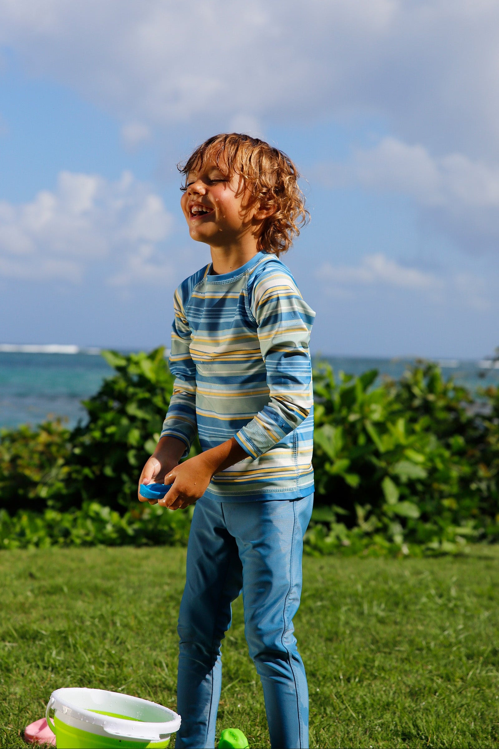 boy playing in kid's long sleeve crew sunny swim shirt in pinecrest stripe|pinecrest-stripe