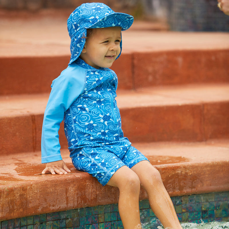 Baby Boy Wading in a Pool in the Baby Boy's Swim Flap Hat|bubble-fish