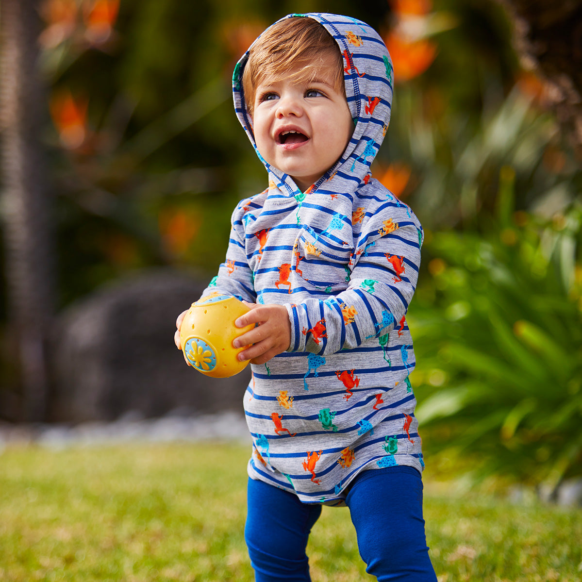 Baby Boy Playing with a Toy Wearing a Hooded Sunzie|climbing-frogs