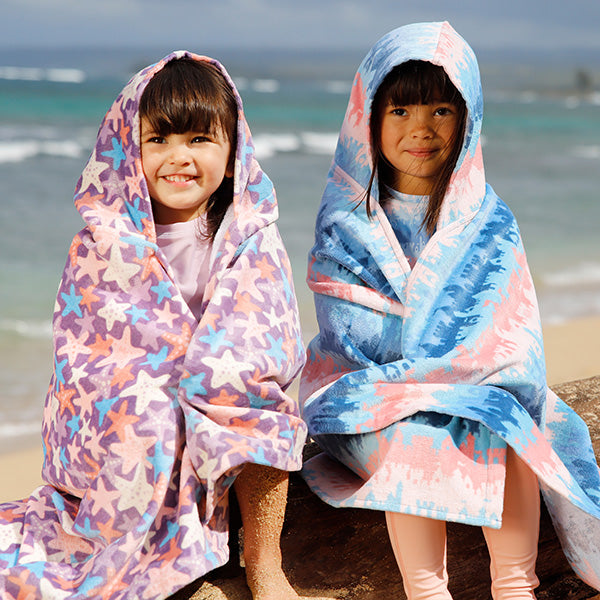 Snuggle up in a kid's hooded beach towel after a day in the waves.