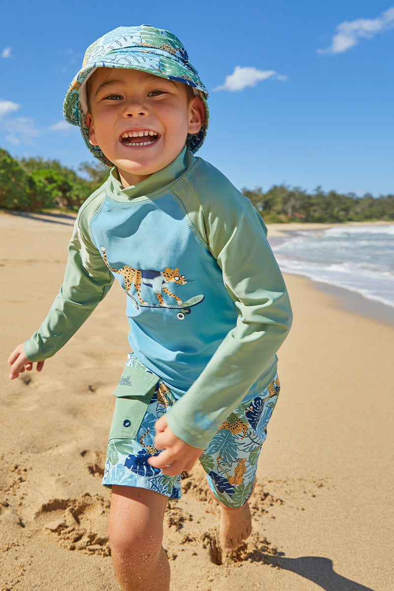 Boy Playing in UV Skinz's Boy's Board Shorts|beetle-mania
