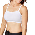 Woman wearing UV Skinz's swim bra in white|white