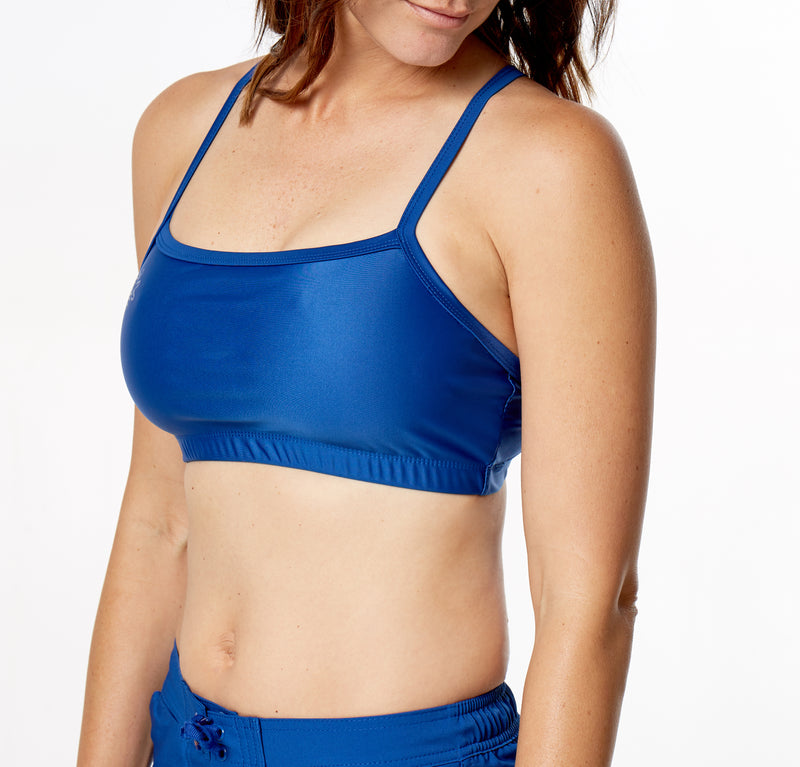 Woman wearing UV Skinz's navy blue swim bra|navy-blue