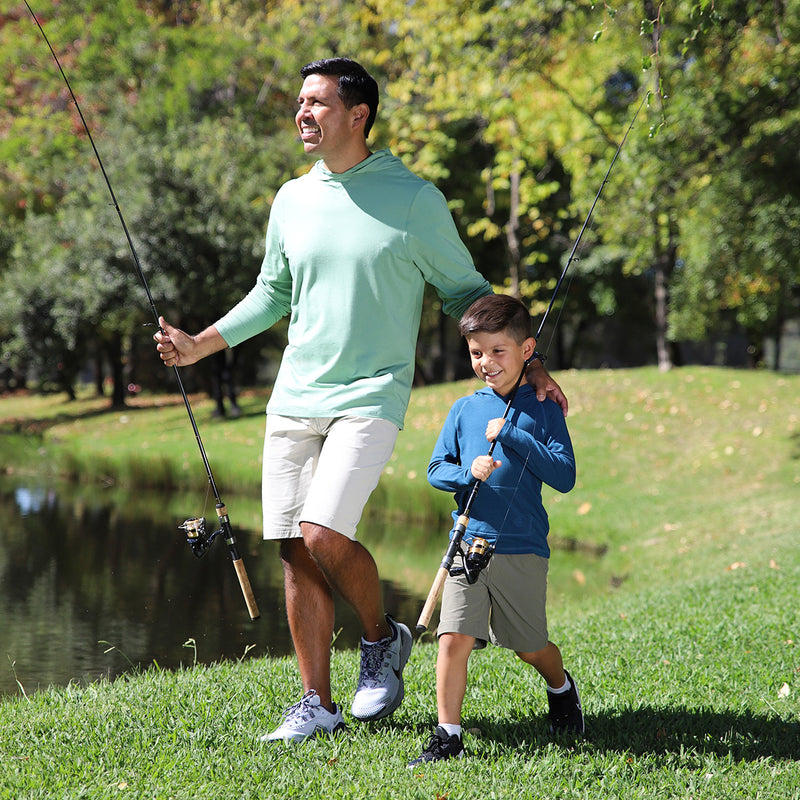 Man fishing with his kid in UV Skinz's men's UPF shorts|stone