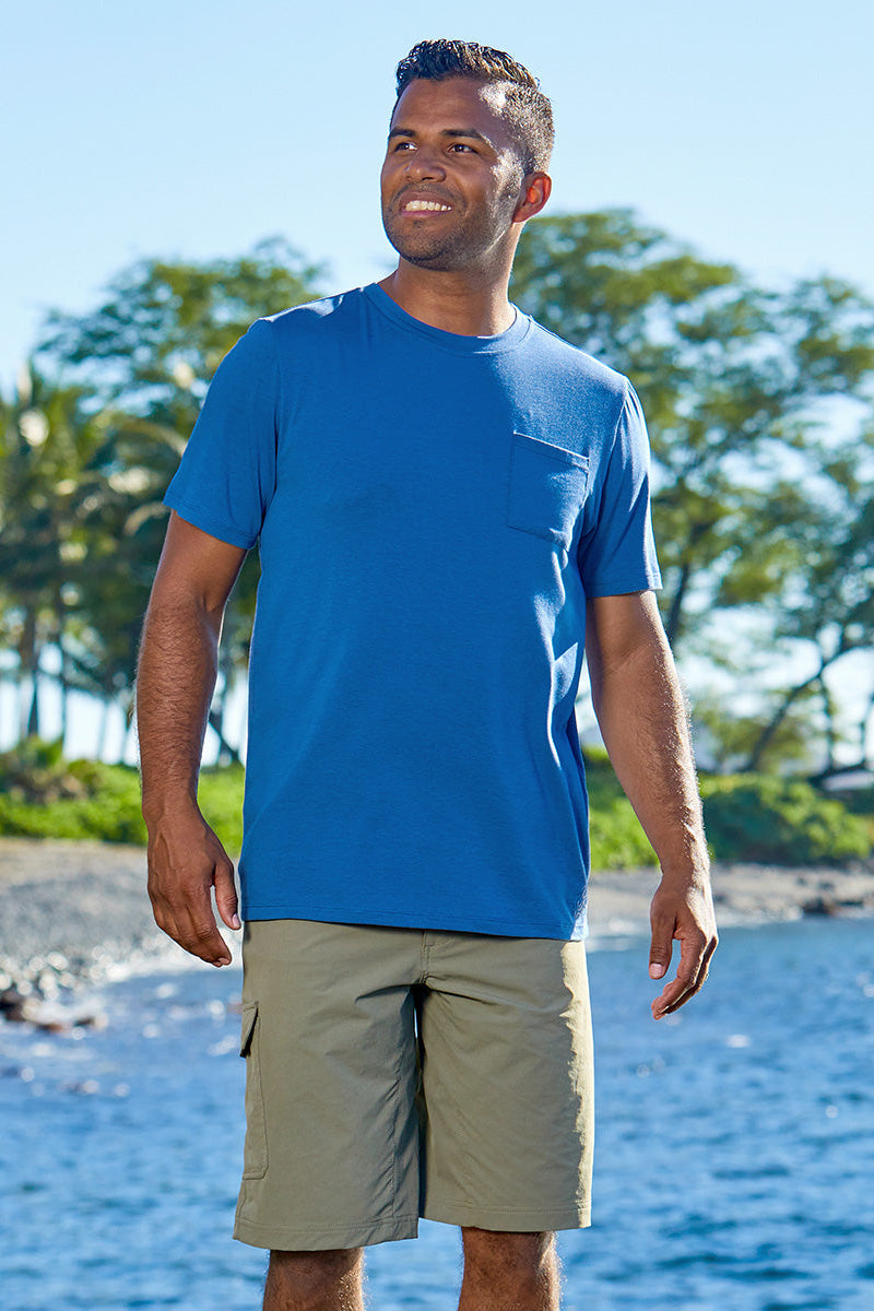 Man at the beach in UV Skinz's men's everyday tee|grey