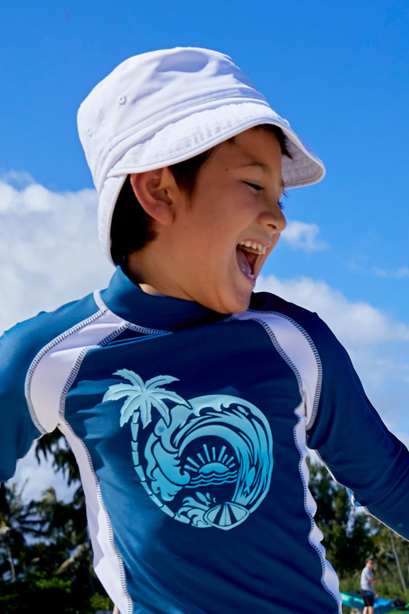 Boy in the Kid's Adjustable Flap Hat in White|white