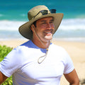 Man wearing UV Skinz's men's wide brim sun hat|khaki-mojave