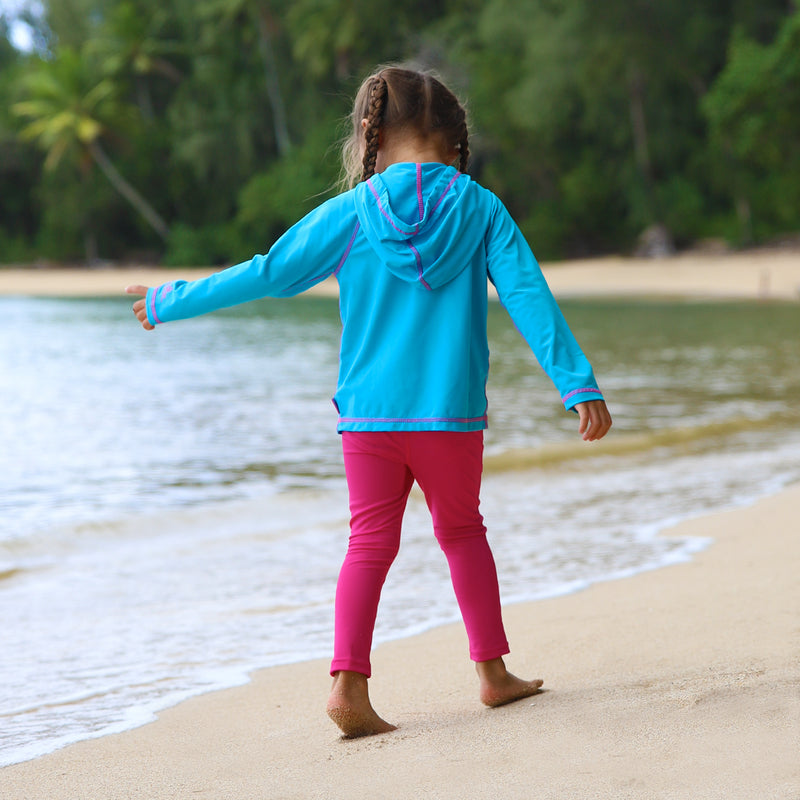 Little girl in UV Skinz's girls pullover hoodie in aqua|aqua